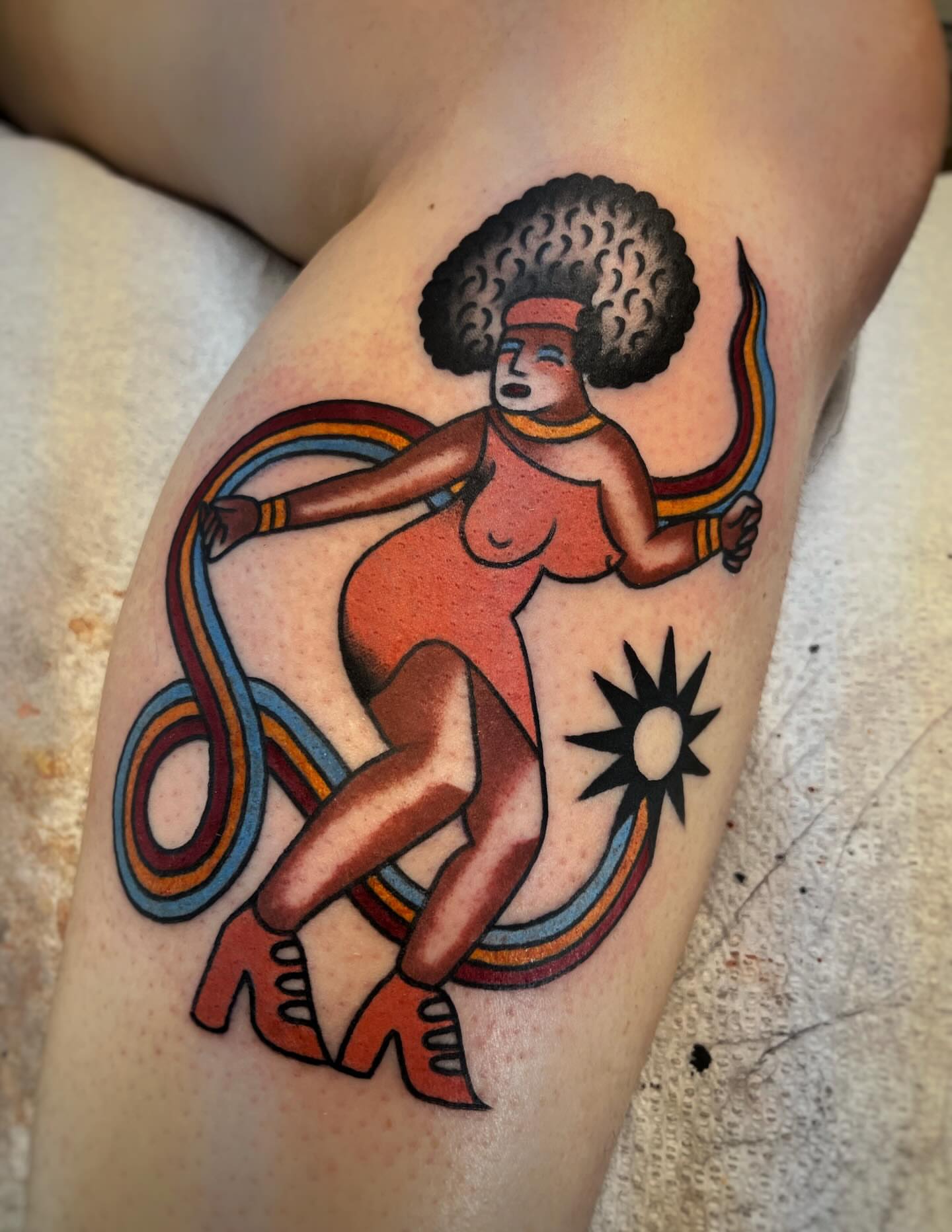 Afro dancer American traditional tattoo on the thigh by Manee Friday