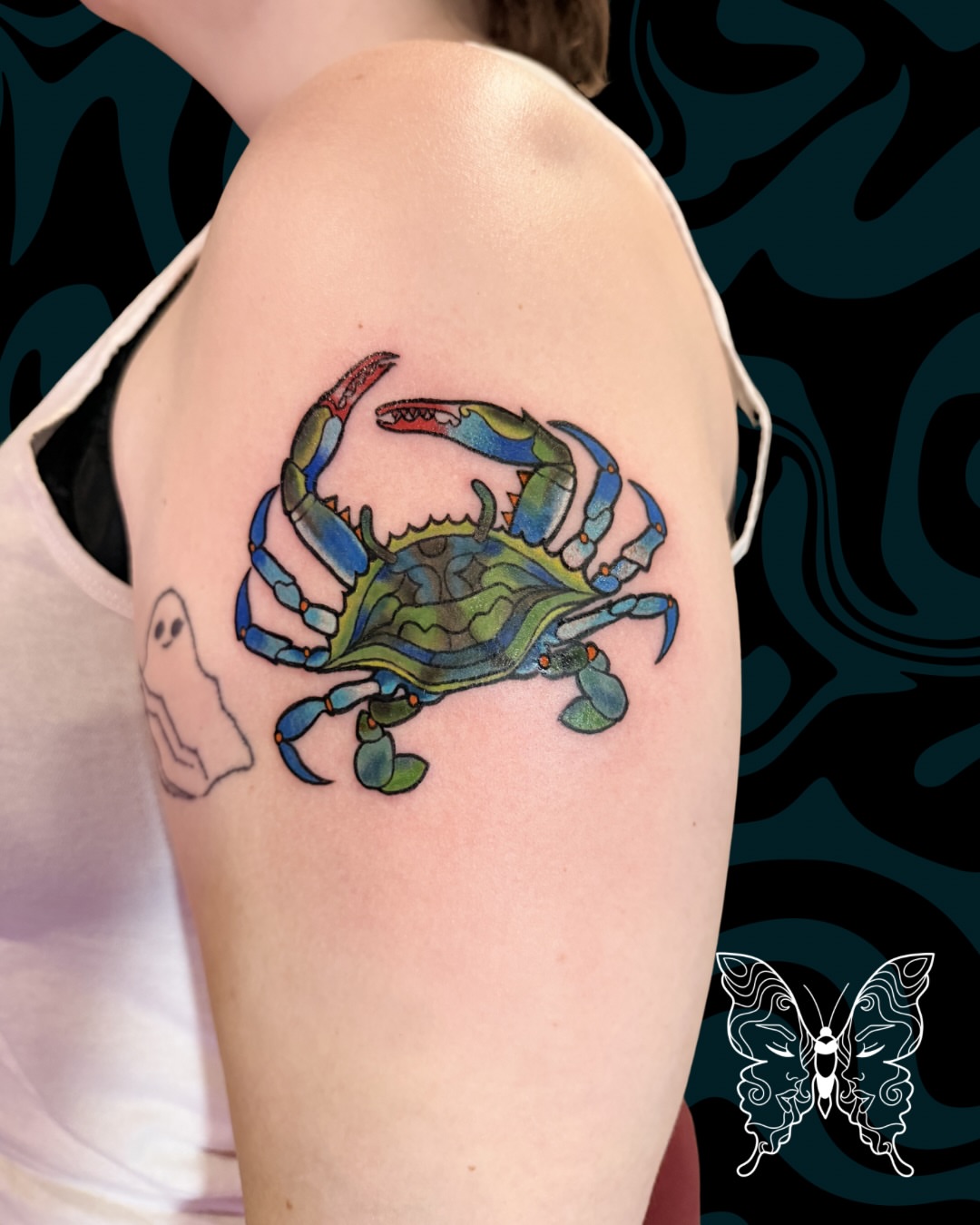 Blue crab realism tattoo on the shoulder by Nicci