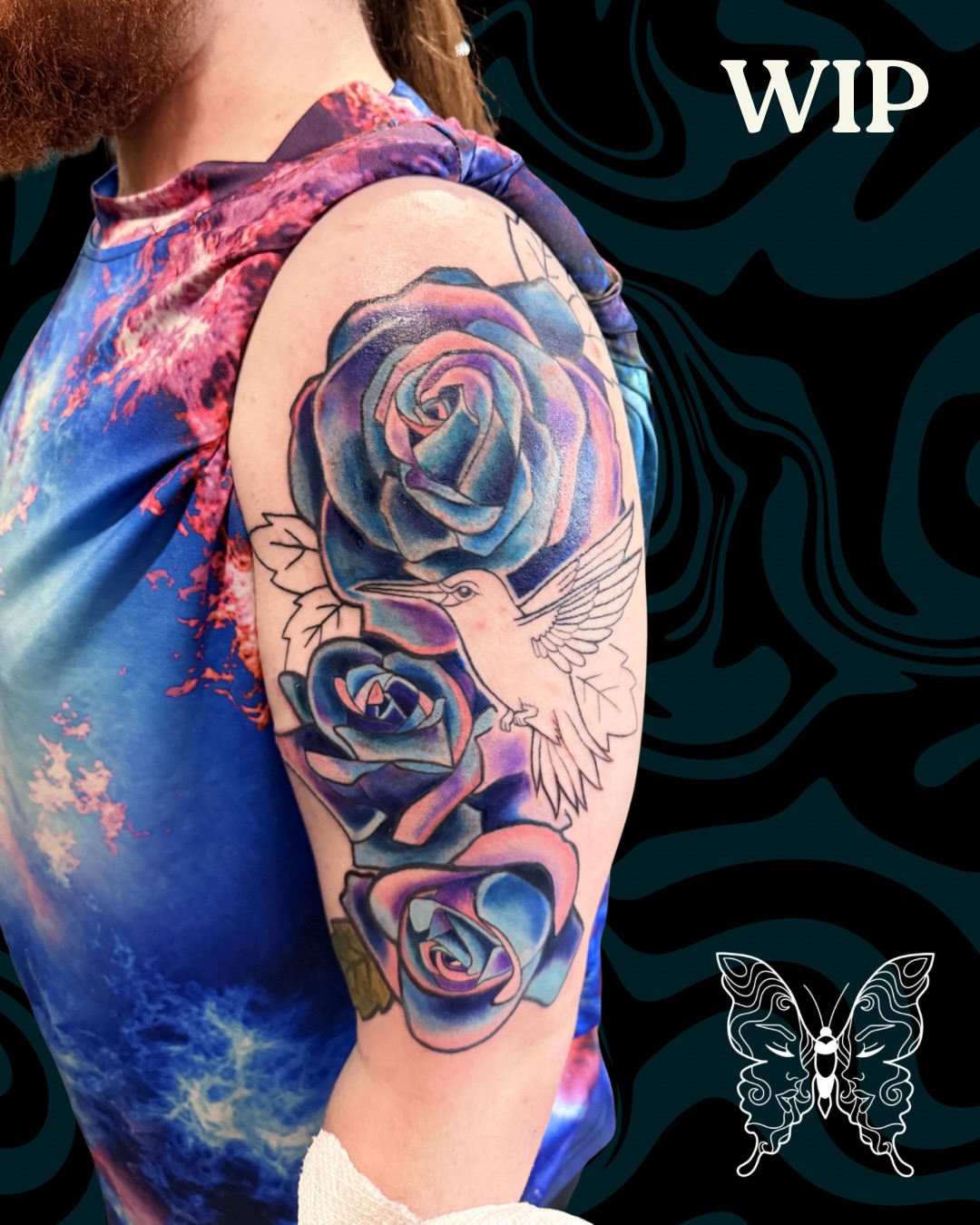 Roses and hummingbird new school tattoo on the upper arm by Nicci