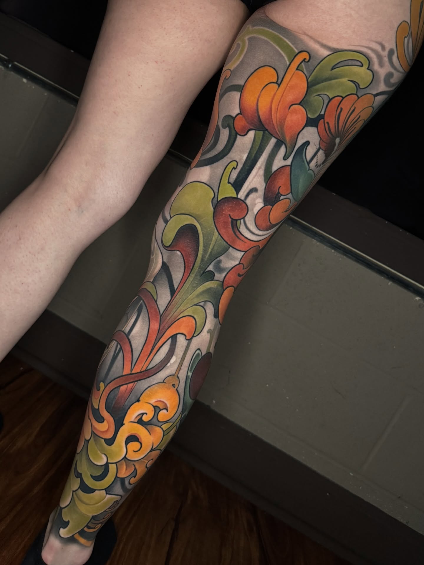 Floral design new school tattoo on the forearm by Freddie Brown, Lombard, IL
