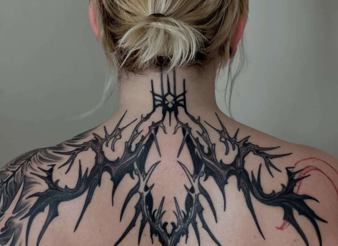 Tattoo by @rizzie_tat2 — blackwork, ornamental