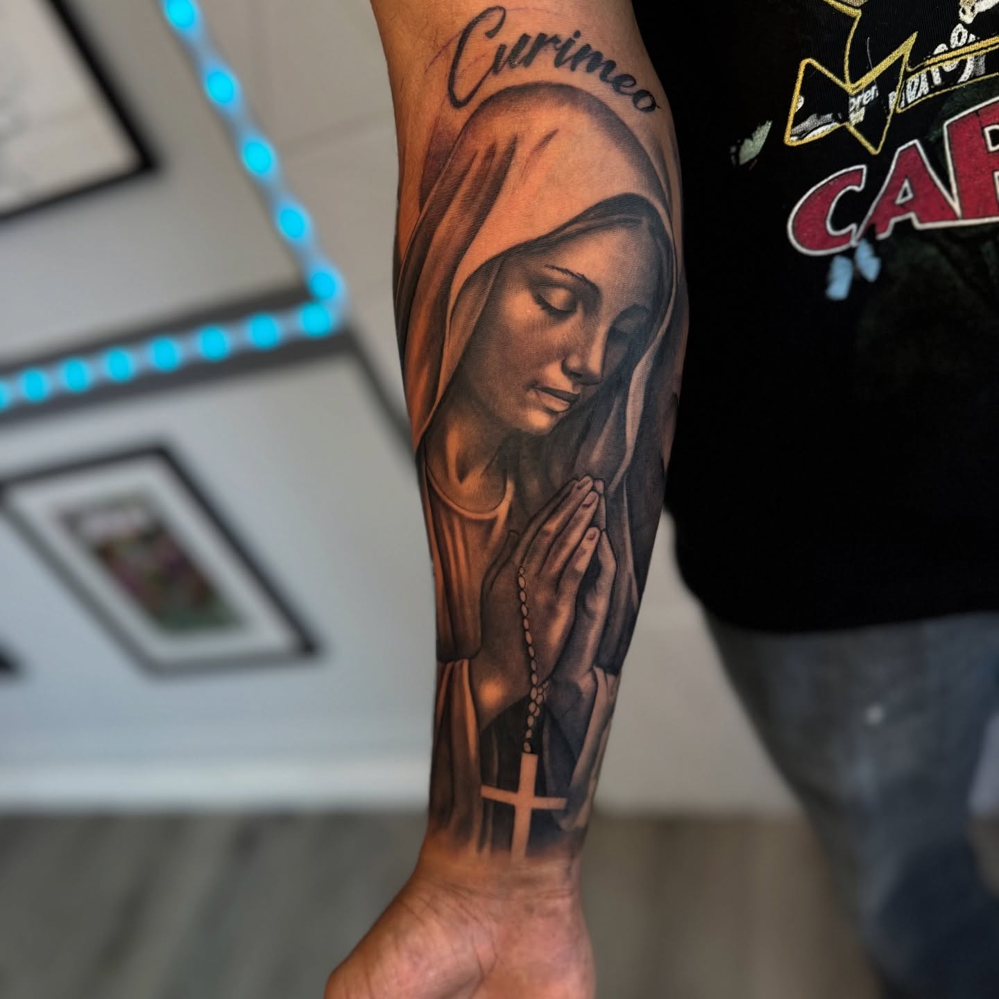 Praying woman realism tattoo on the forearm by Isiah Hall, Whittier, California