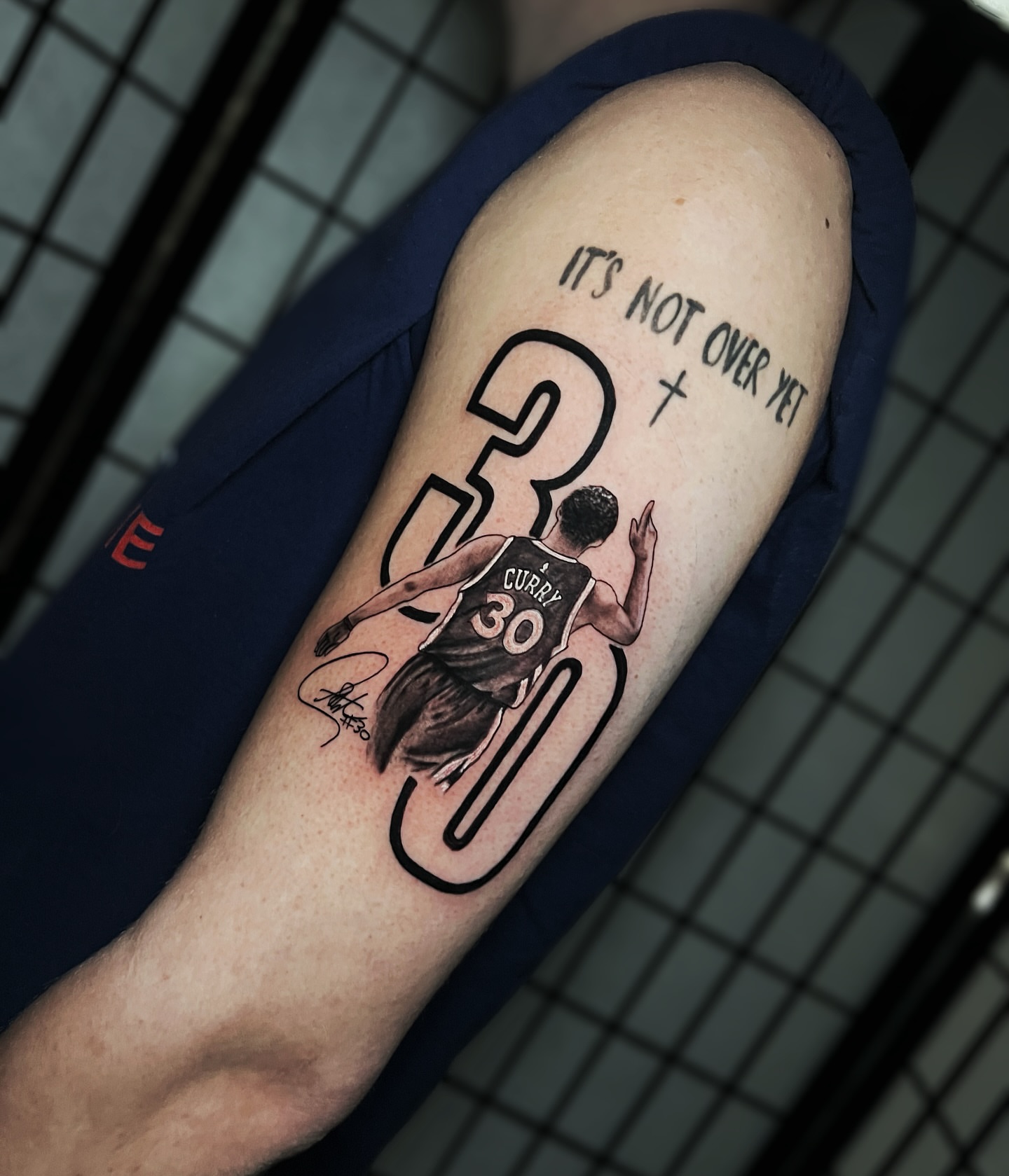 Basketball player realism tattoo on the forearm by Tattoo Artist
