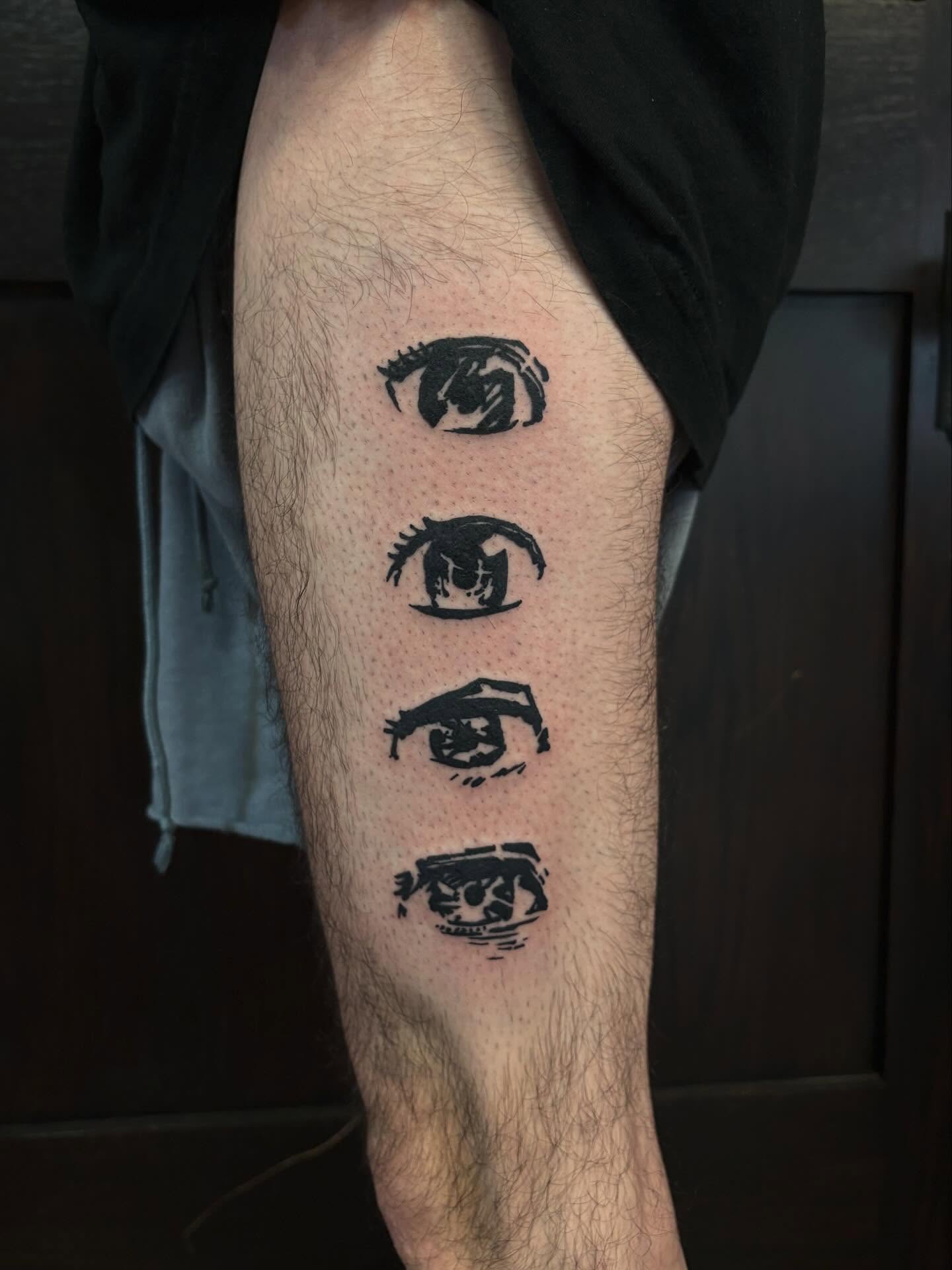 Eyes black and grey tattoo on the forearm by kane