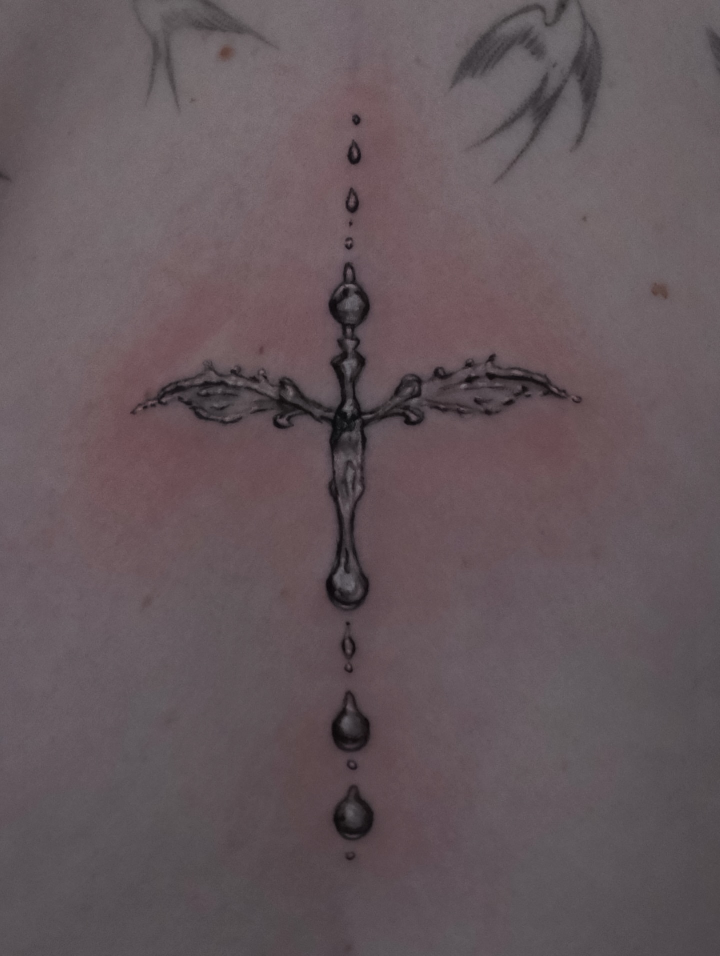Cross with dripping drops dotwork tattoo on the torso by AL 777, Denton, Texas