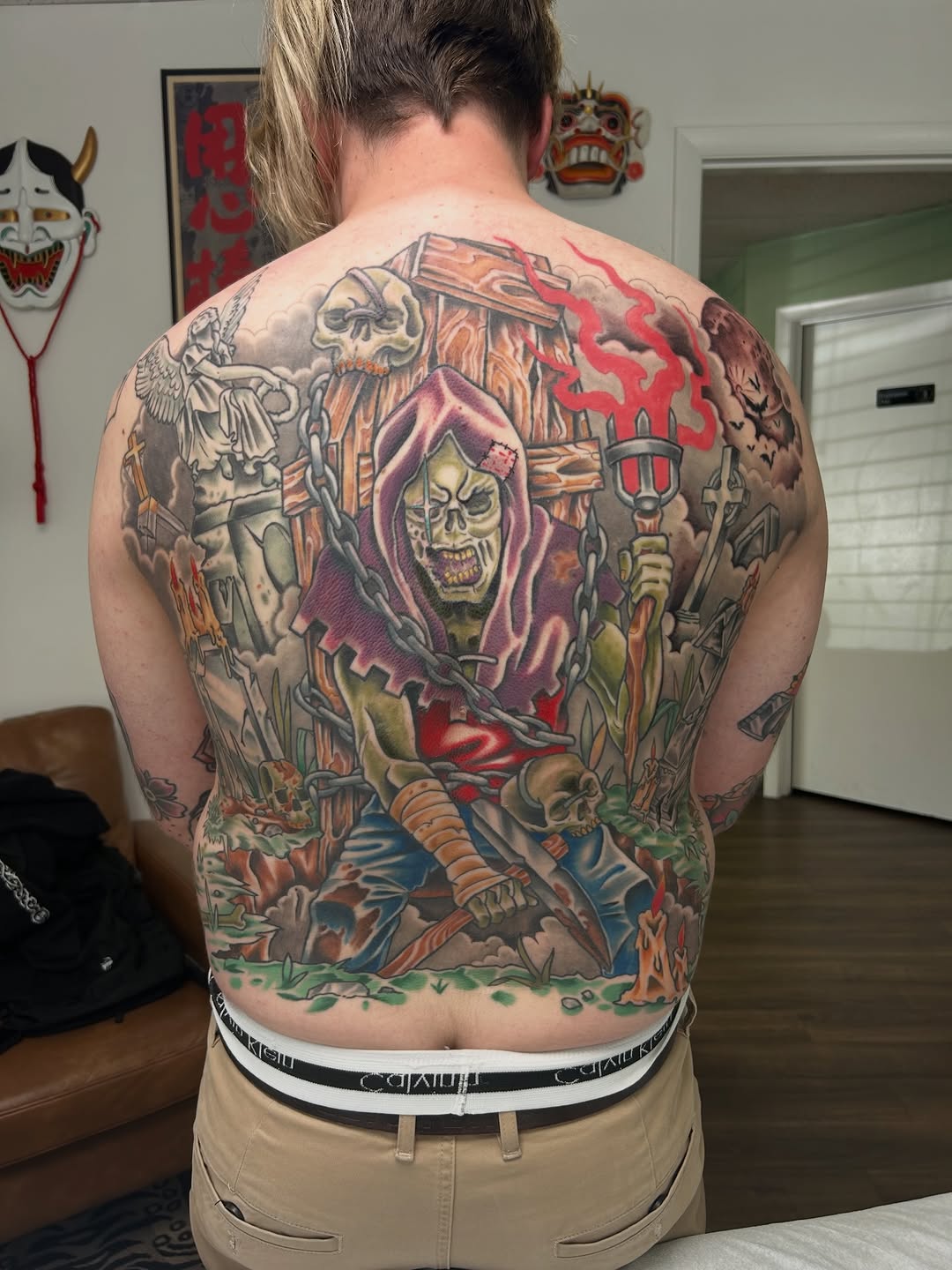 Grim Reaper with coffin and angel Japanese tattoo on the back by Dane Mitchell