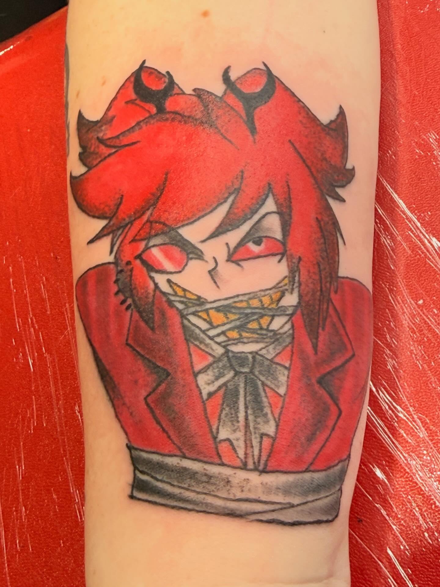 Red-haired anime character anime tattoo on the forearm by Jones Eric