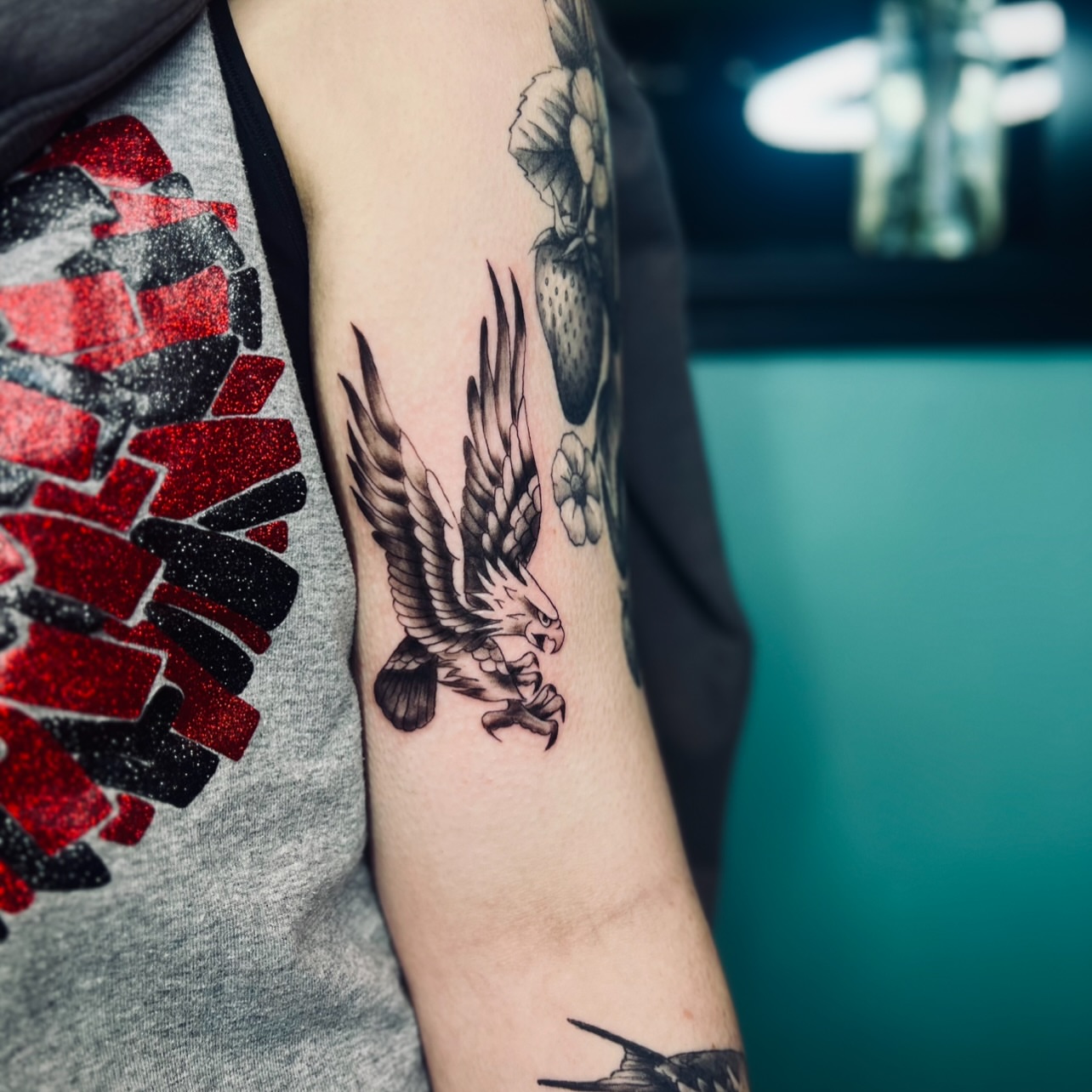 Eagle black and grey tattoo on the forearm by Sydney Rose