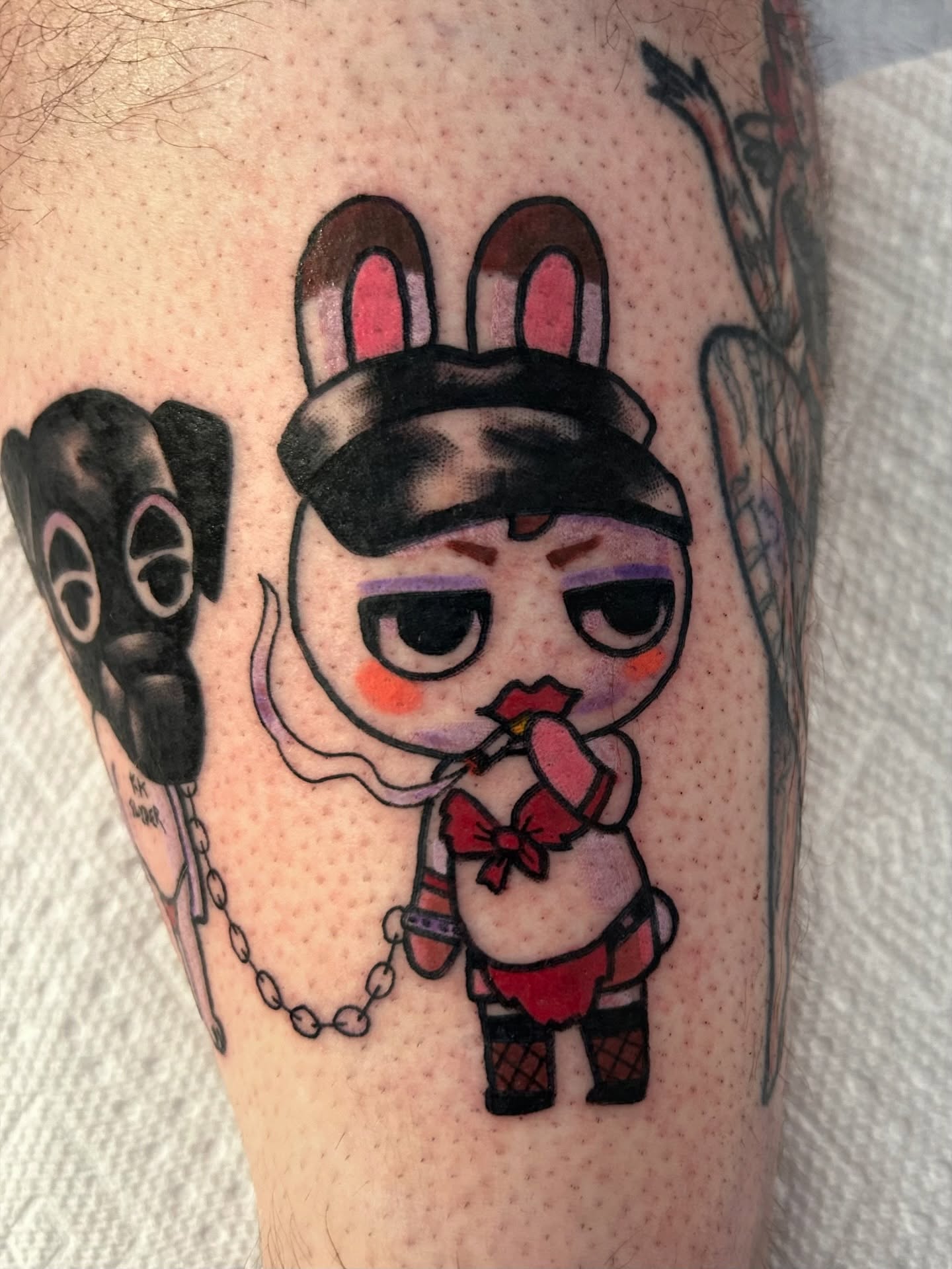 Anime character anime tattoo on the forearm by Ollie