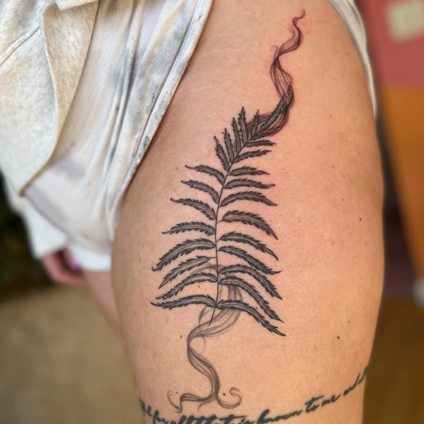 Fern black and grey tattoo on the thigh by 🌼DaisyDaiz🕸️