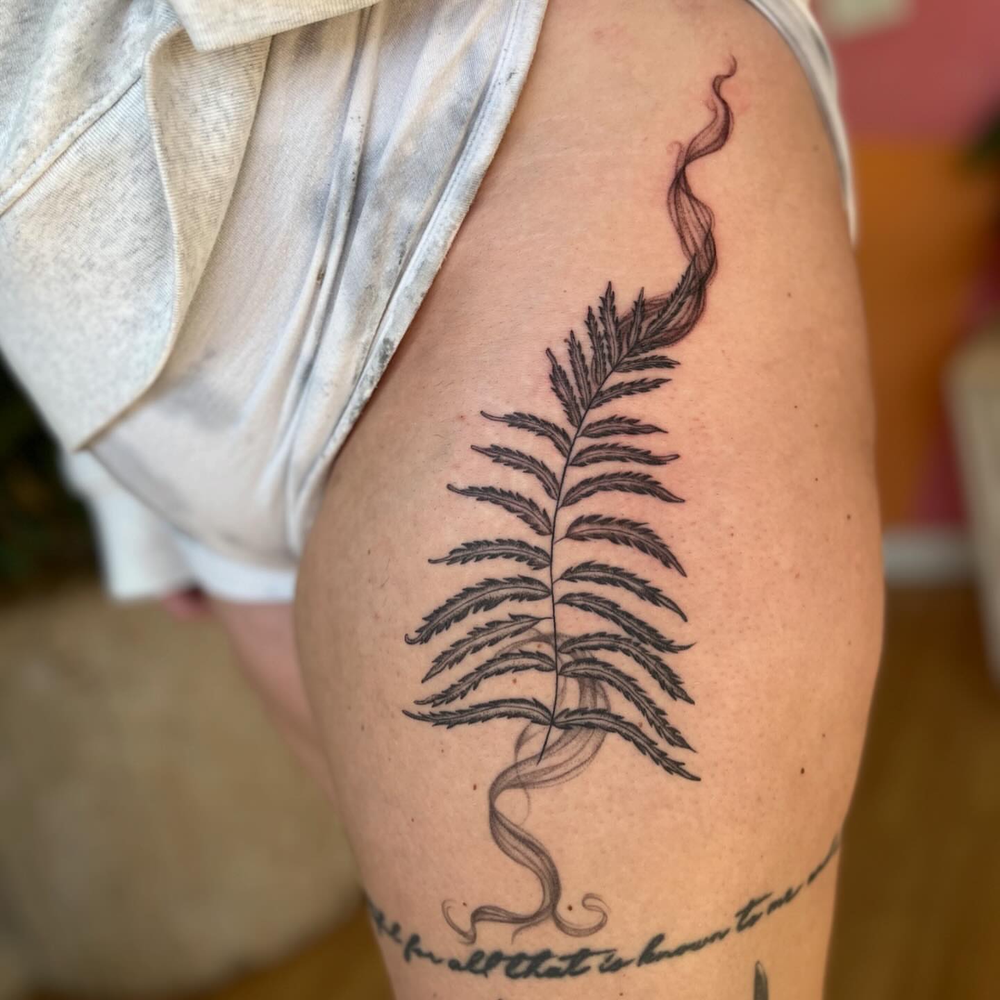 Fern black and grey tattoo on the thigh by 🌼DaisyDaiz🕸️