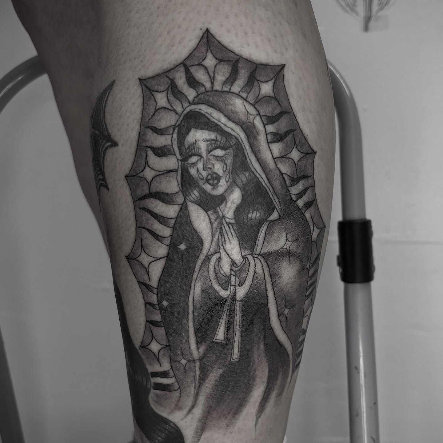 Religious figure realism tattoo on the forearm by Weho Tattoo Artist Lupe