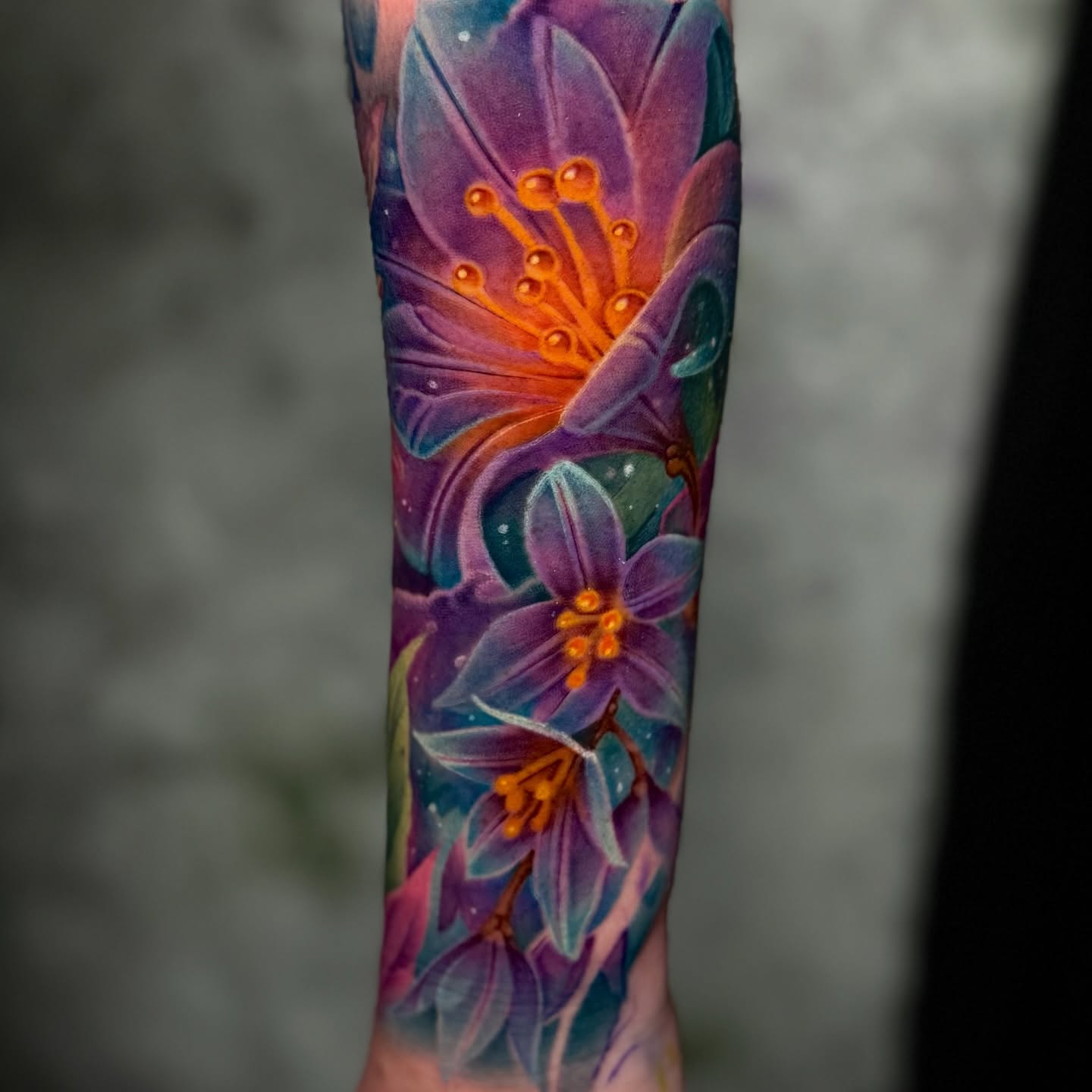 Purple flowers dotwork tattoo on the forearm by James Hall