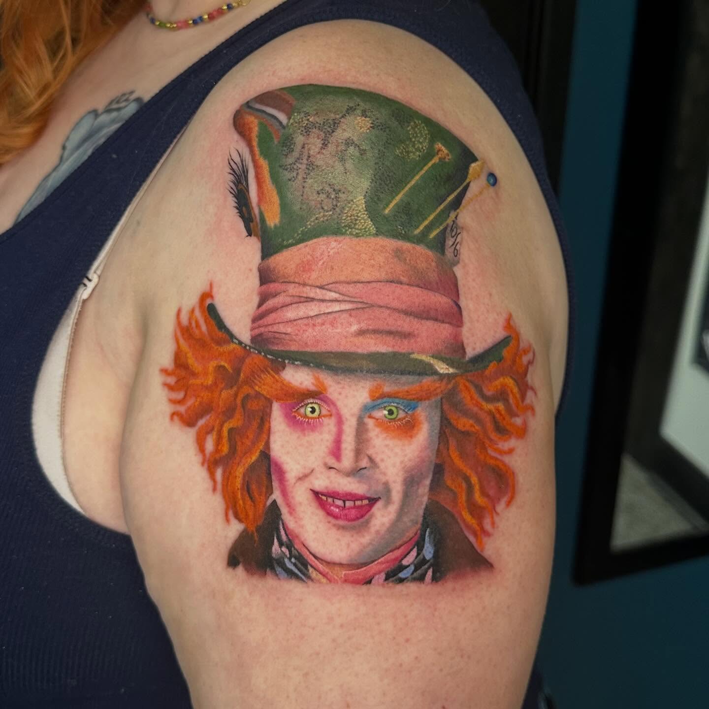 Mad hatter realism tattoo on the shoulder by Victoria Parsons, Clarksville, Indiana
