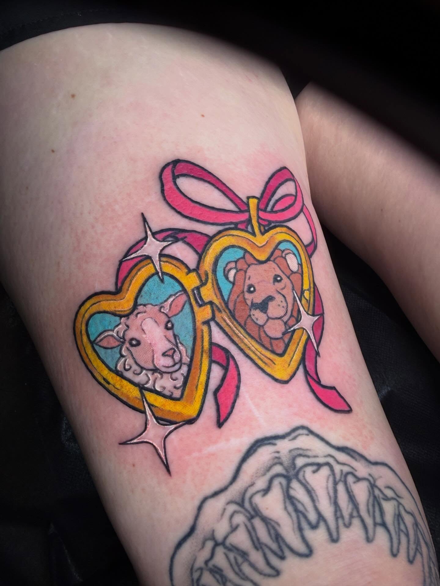 Heart-shaped mirrors American traditional tattoo on the thigh by Erin McDavis
