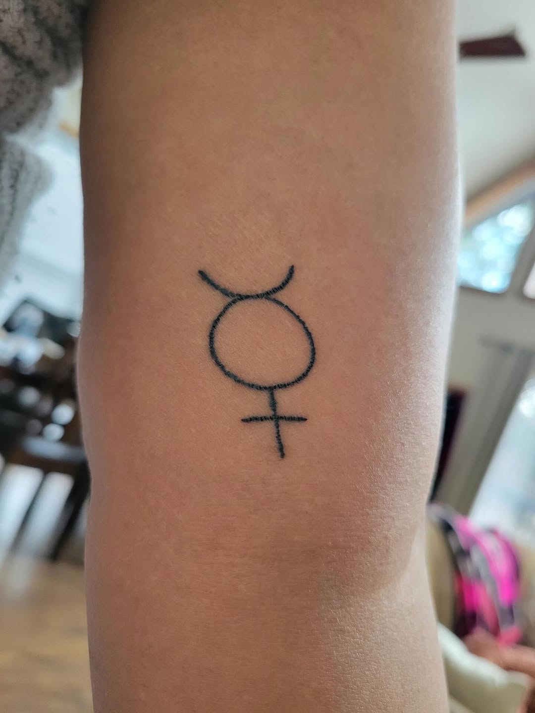 Astrological symbol tattoo on the forearm by Emma D