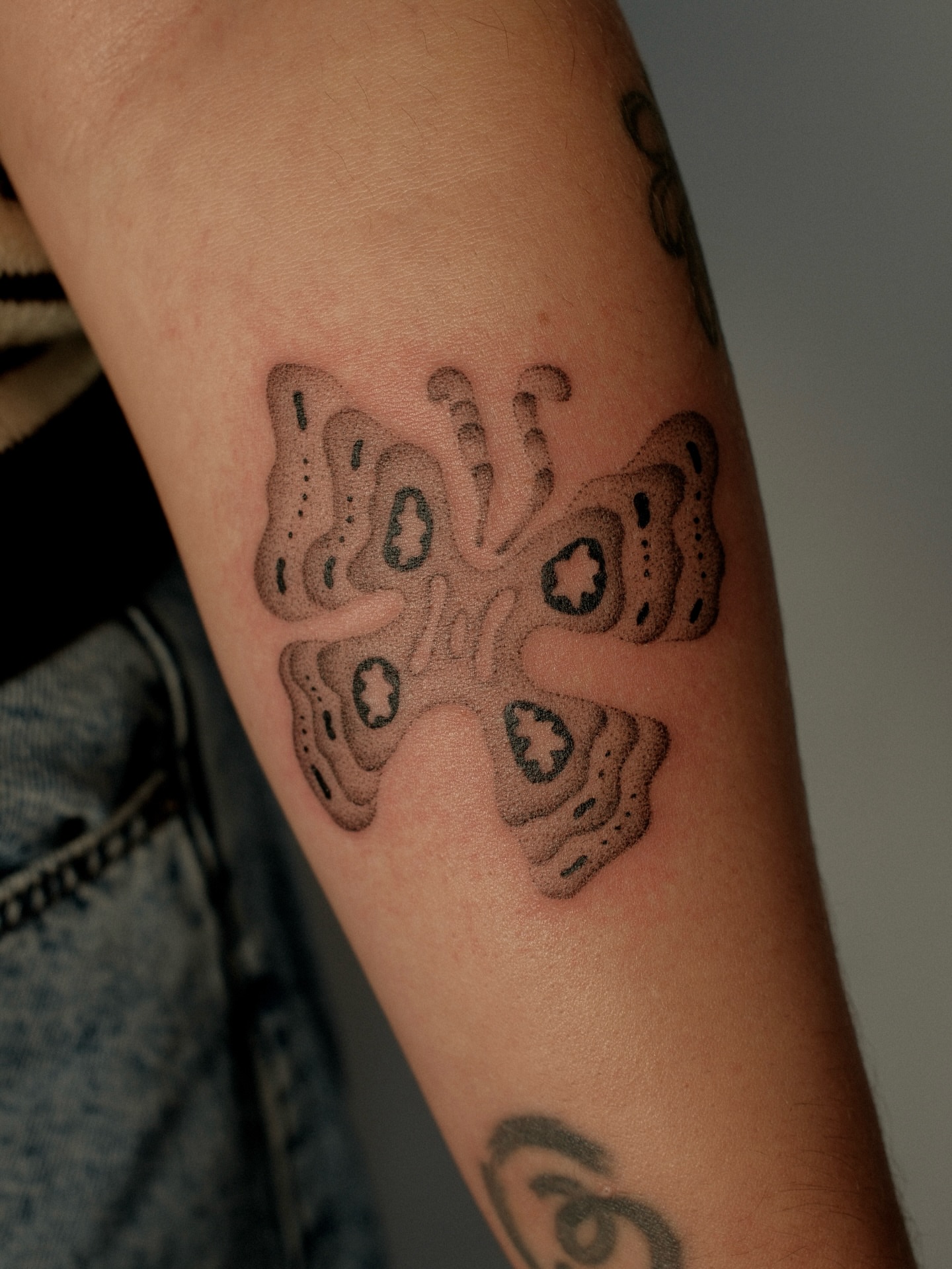 Abstract pattern dotwork tattoo on the forearm by Diana ๐ซ