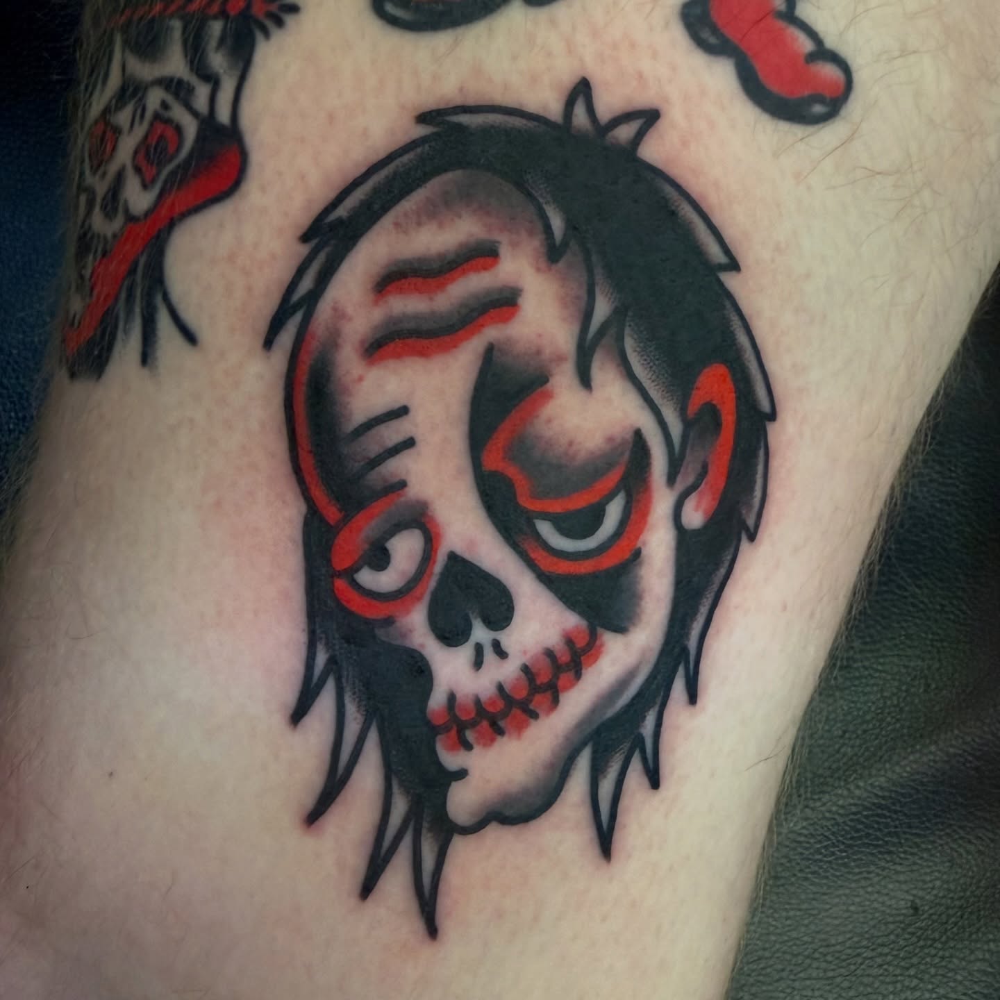 Skull American traditional tattoo on the forearm by Buddy (Holiday) Orr, Las Vegas, Nevada