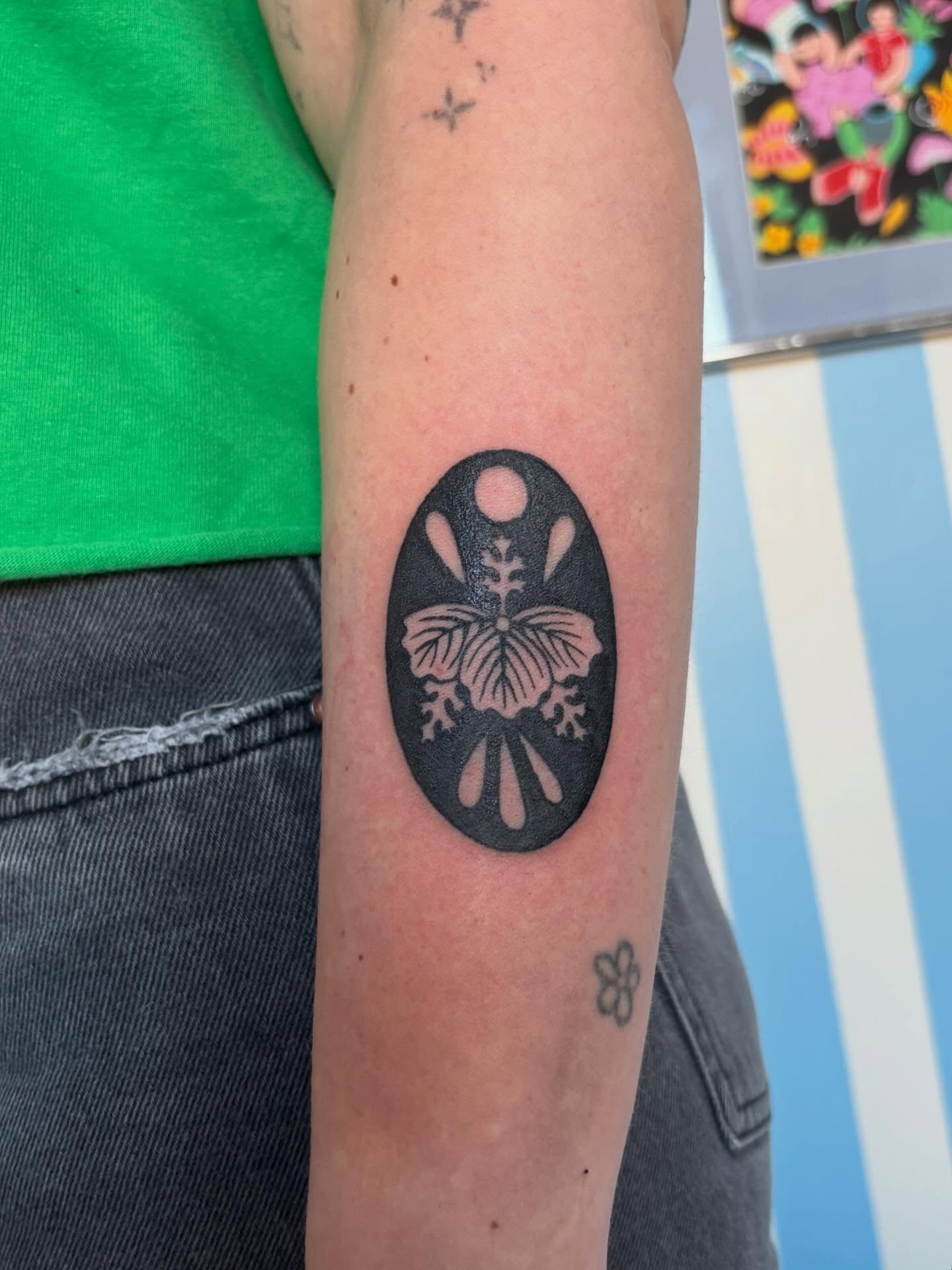 Butterfly black and grey tattoo on the forearm by Ashley Ellerman