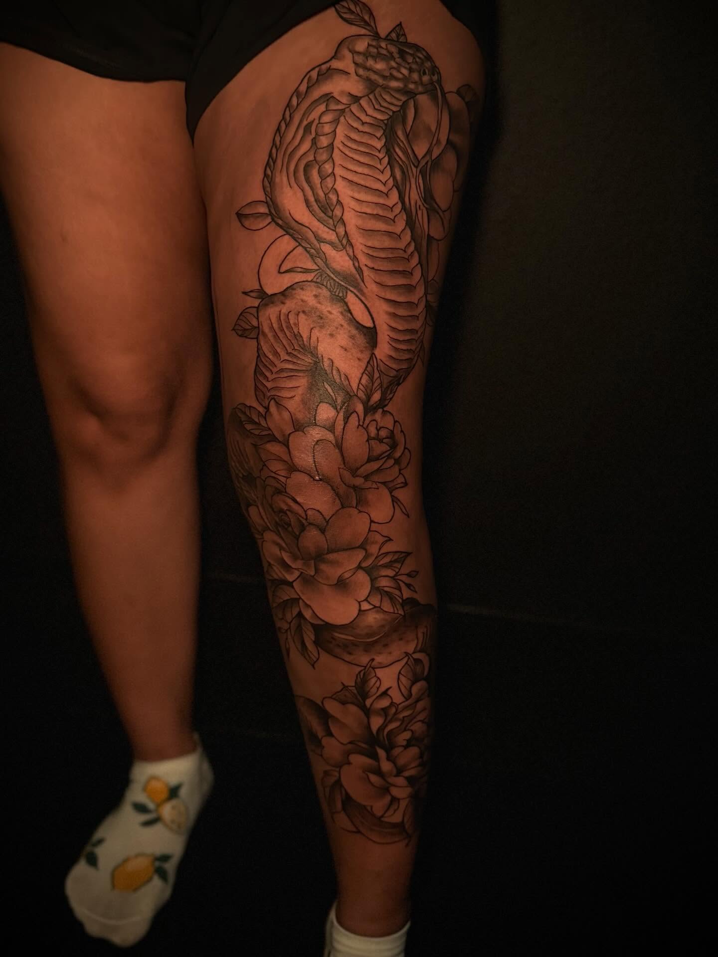 Koi fish and flowers realism tattoo on the thigh by Blair The Artist!