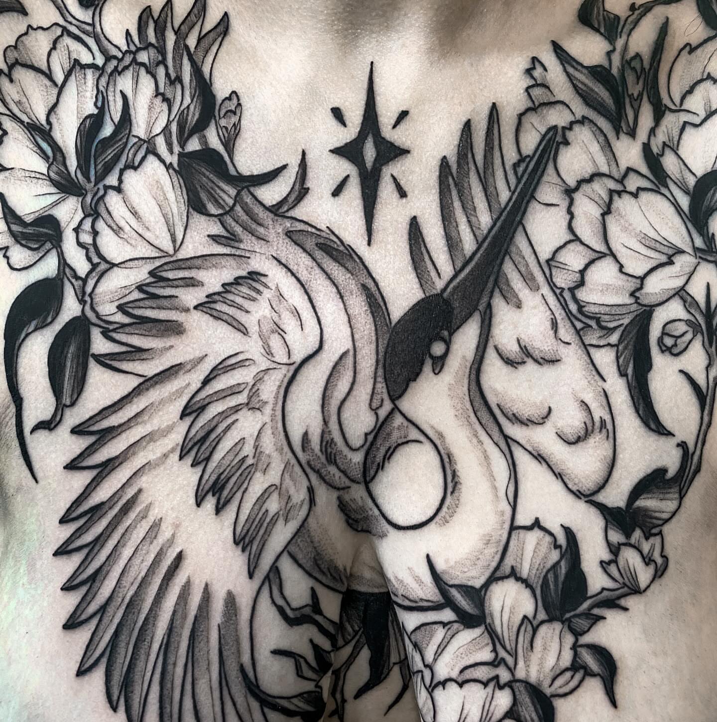 Crane and flowers black and grey tattoo on the chest by ✥ G i t t a ✥