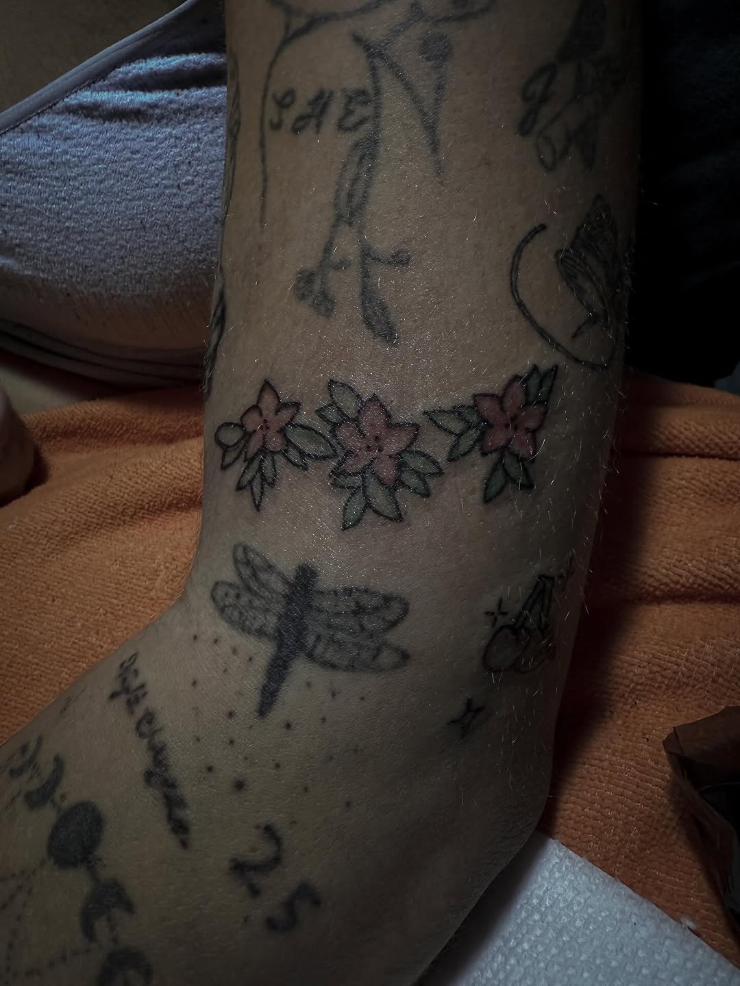 Flowers and dragonfly minimalist tattoo on the foot by ☆ ciara ☆