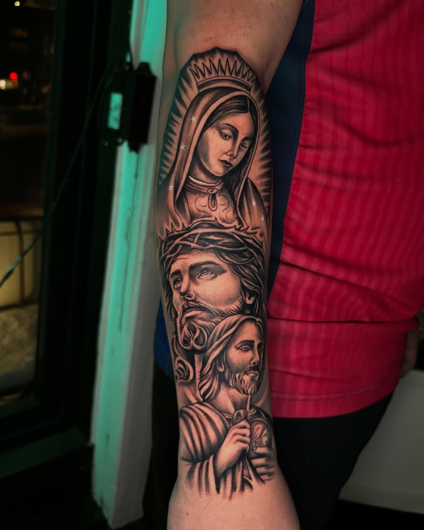 Religious figures realism tattoo on the forearm by Daero Tattoo, New York, New York