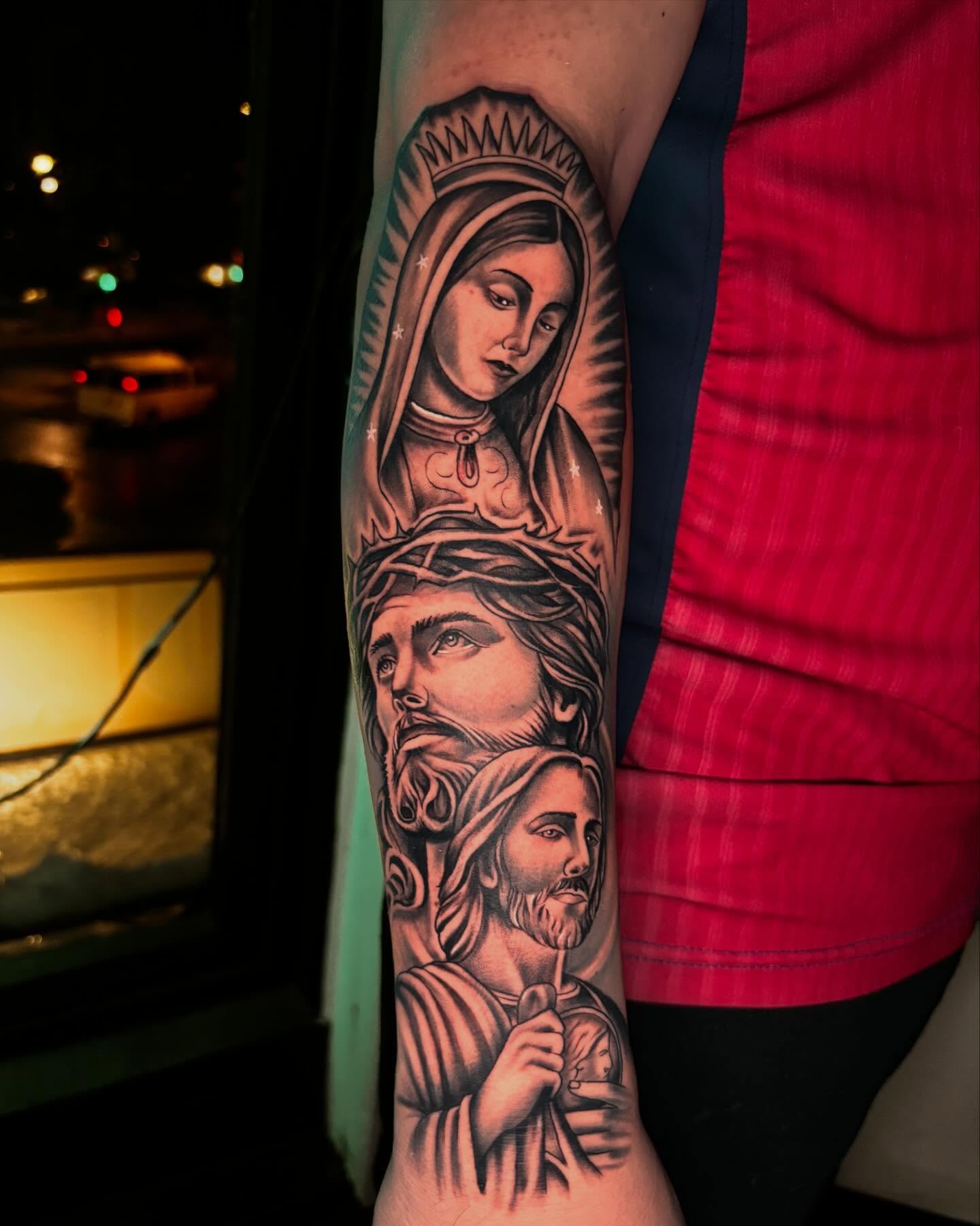 Religious figures realism tattoo on the forearm by Daero Tattoo, New York, New York