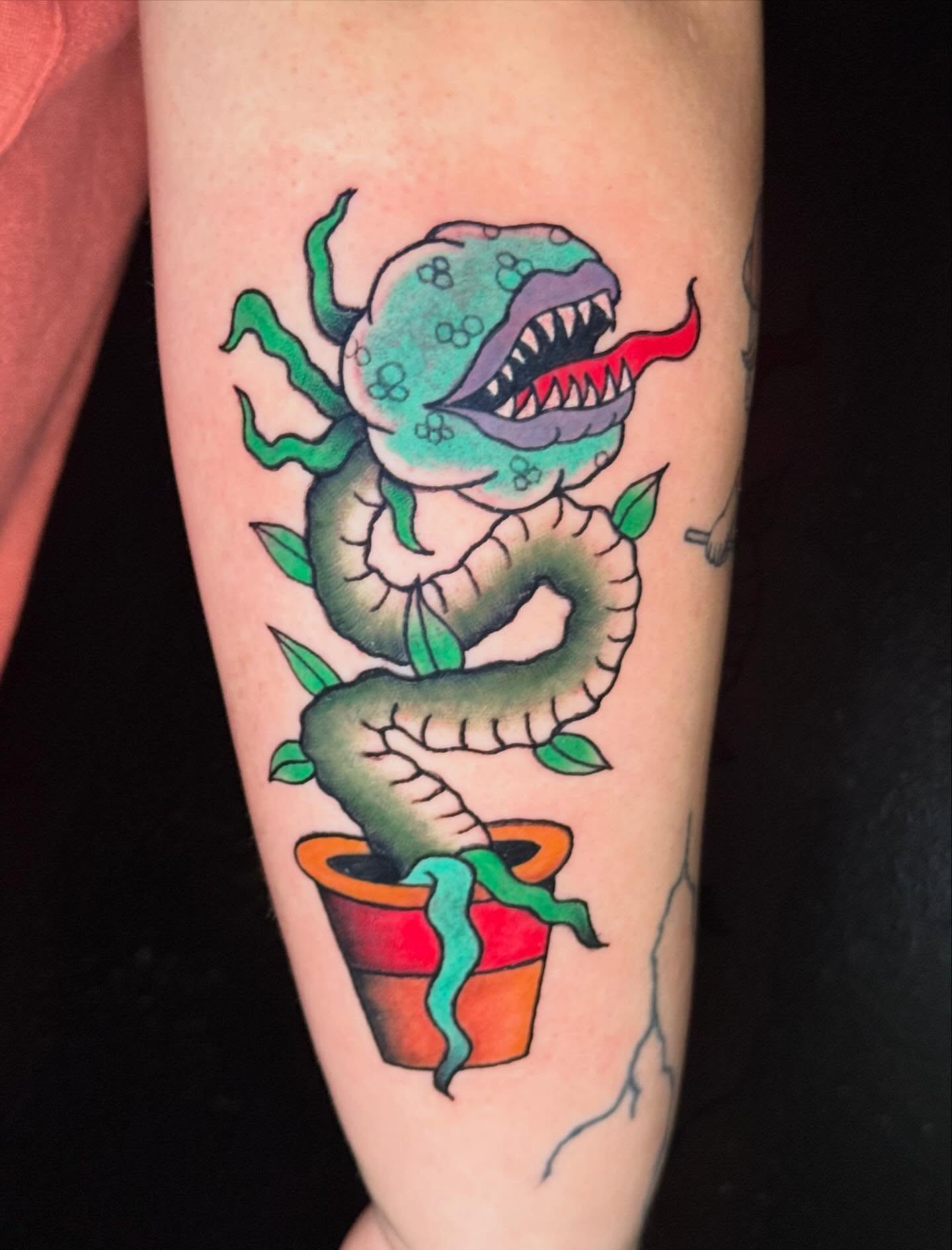Plant monster new school tattoo on the forearm by CAT