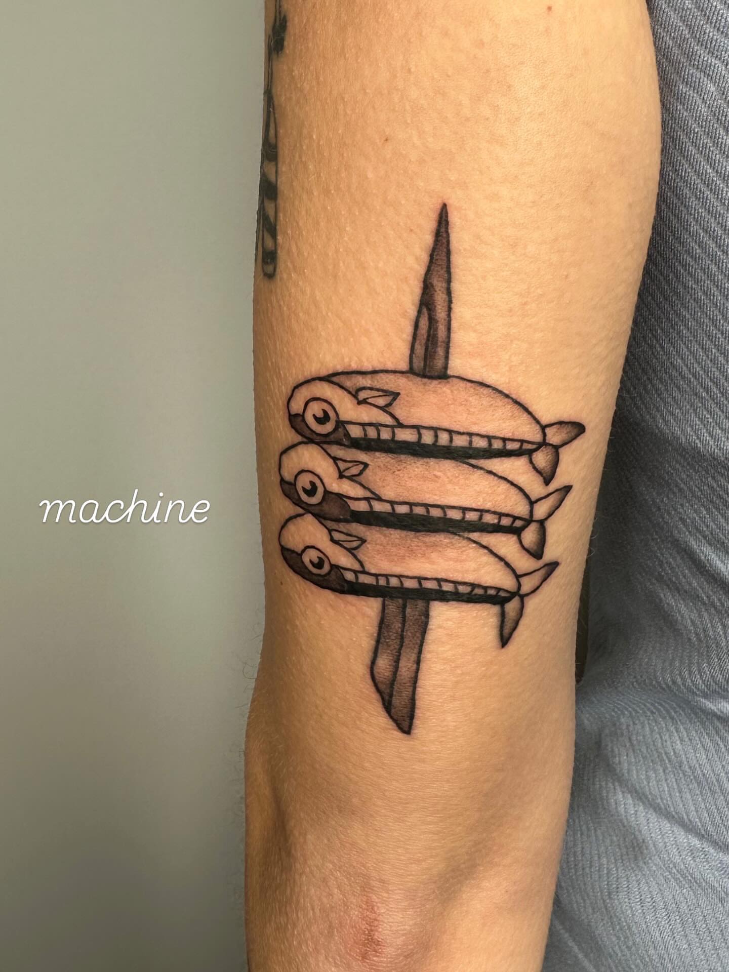 Fishes black and grey tattoo on the forearm by Sadie Spades Philly Tattoos