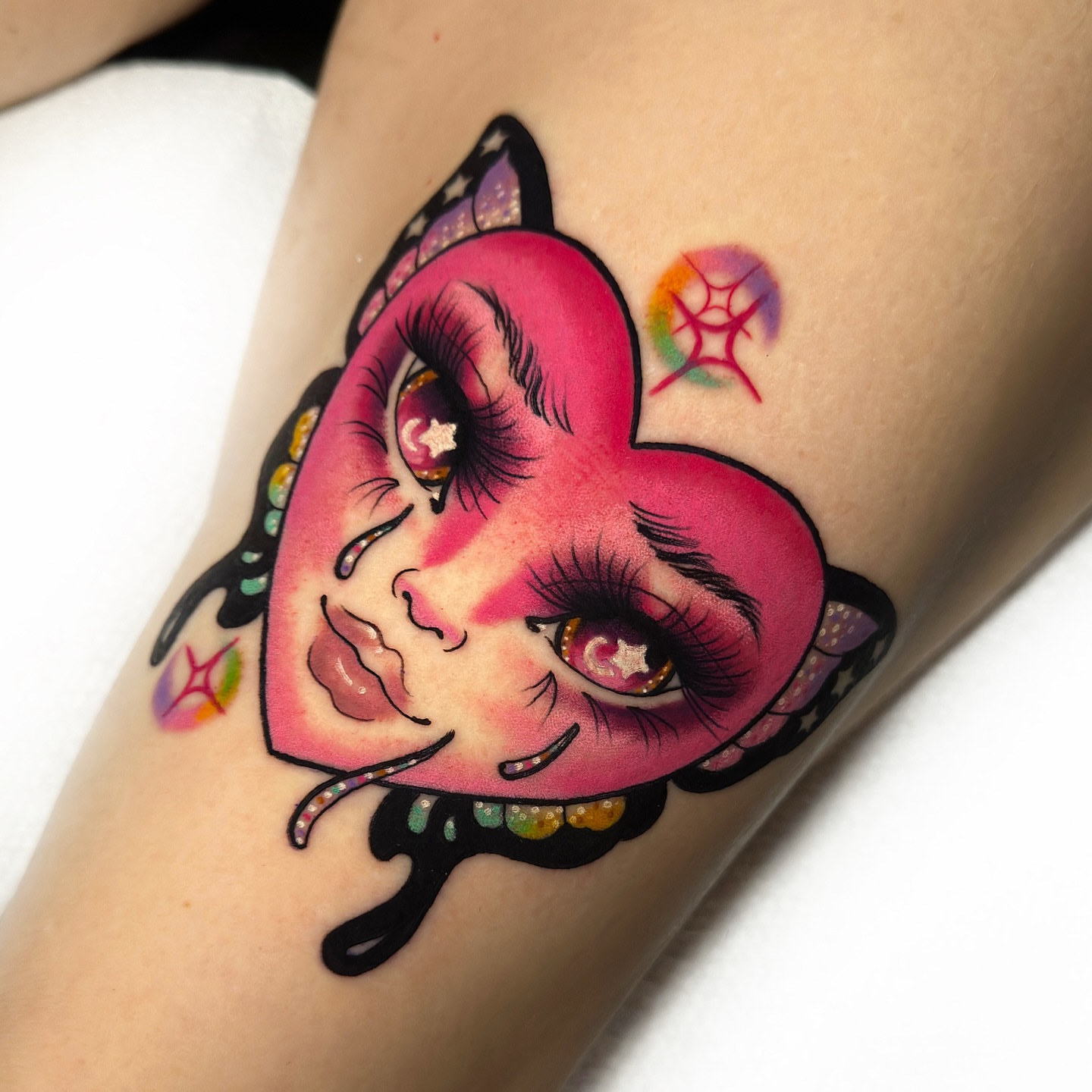 Heart-shaped face American traditional tattoo on the forearm by πππ«π ππ¨ππ₯, Dallas, Texas