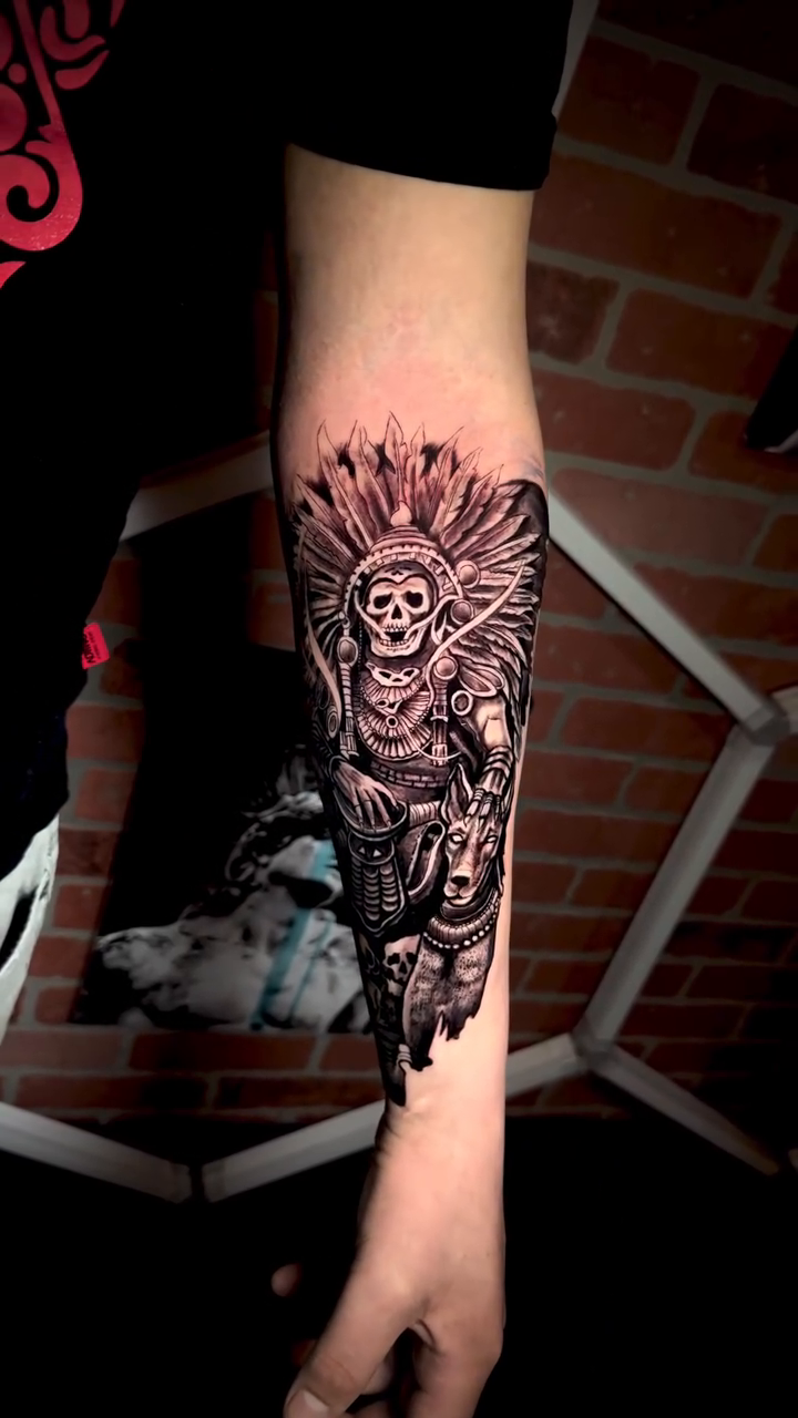 Skull with headdress realism tattoo on the forearm by Andres Calvo🇺🇸🇨🇴