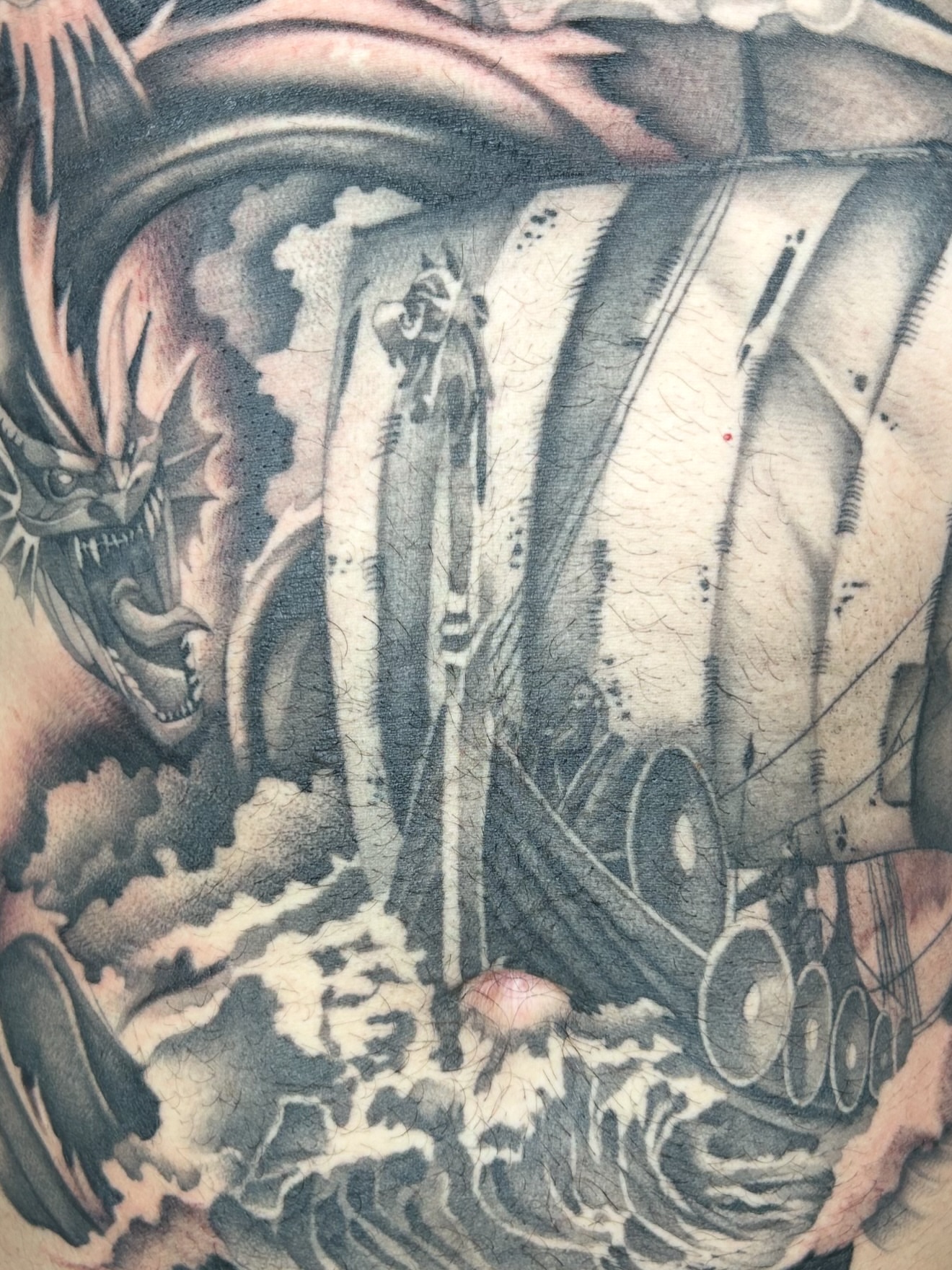 Shipwreck realism tattoo on the torso by Joe Weber, Monona, Wisconsin