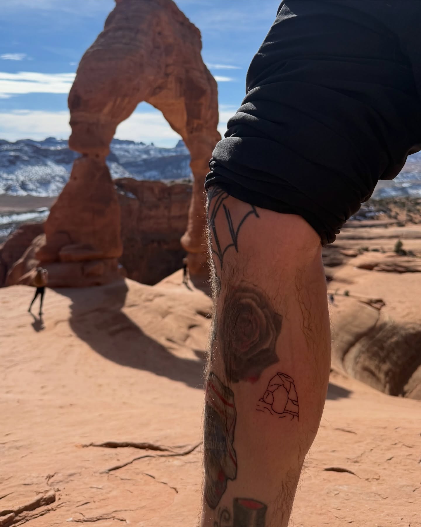 Rose black and grey tattoo on the thigh by Belfry Tattoo