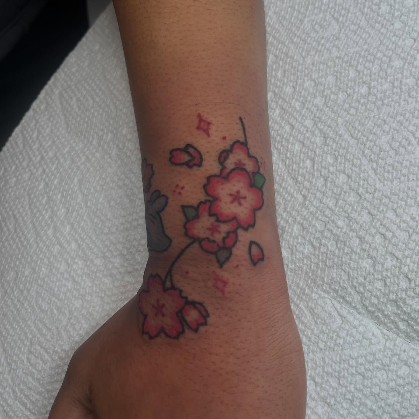 Cherry blossoms dotwork tattoo on the forearm by madelynne (maddie) caldwell tattoos