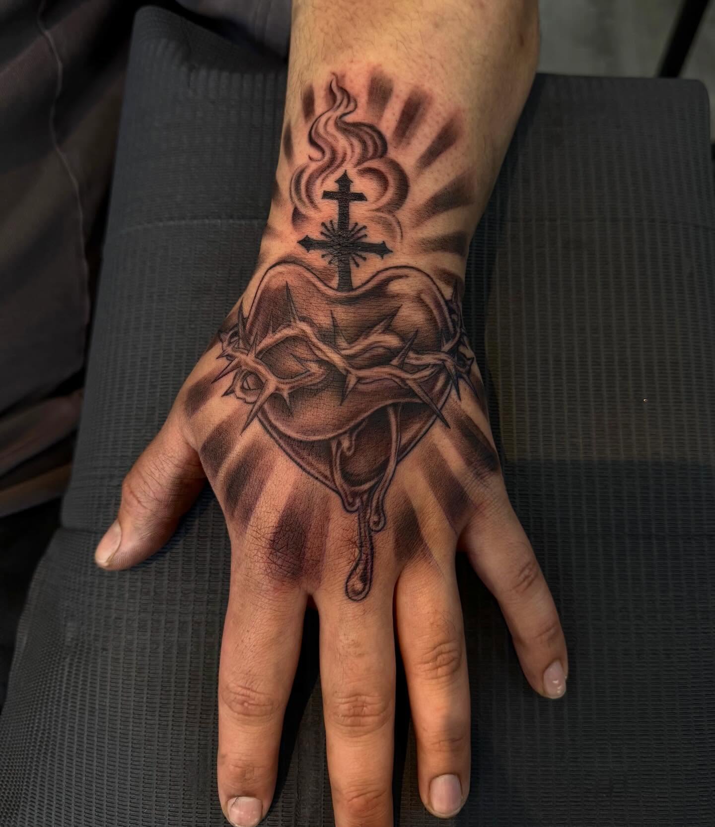 Religious crucifixion scene realism tattoo on the hand by ππππππ