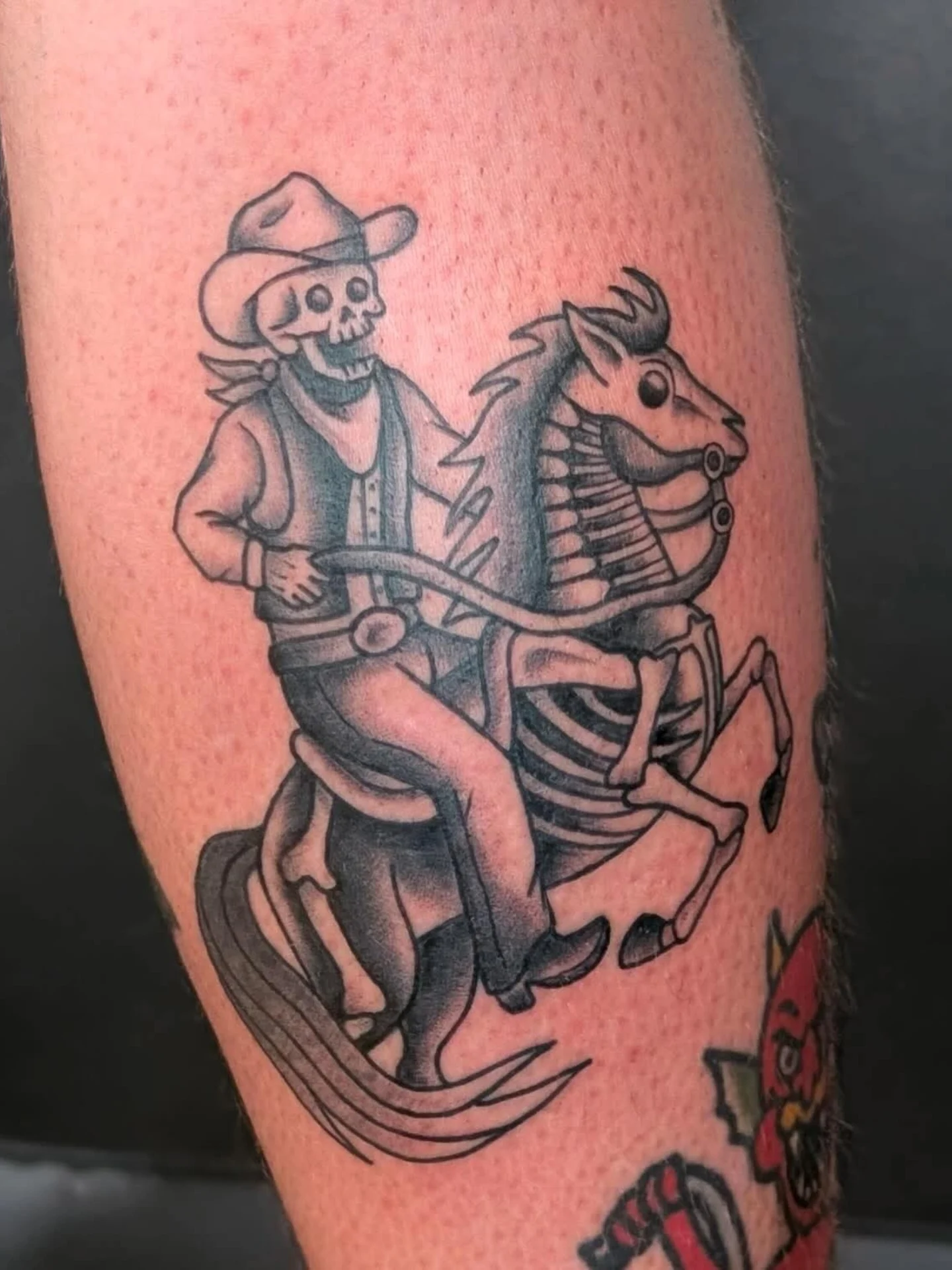 Cowboy skeleton riding horse American traditional tattoo on the forearm by π²π°πket