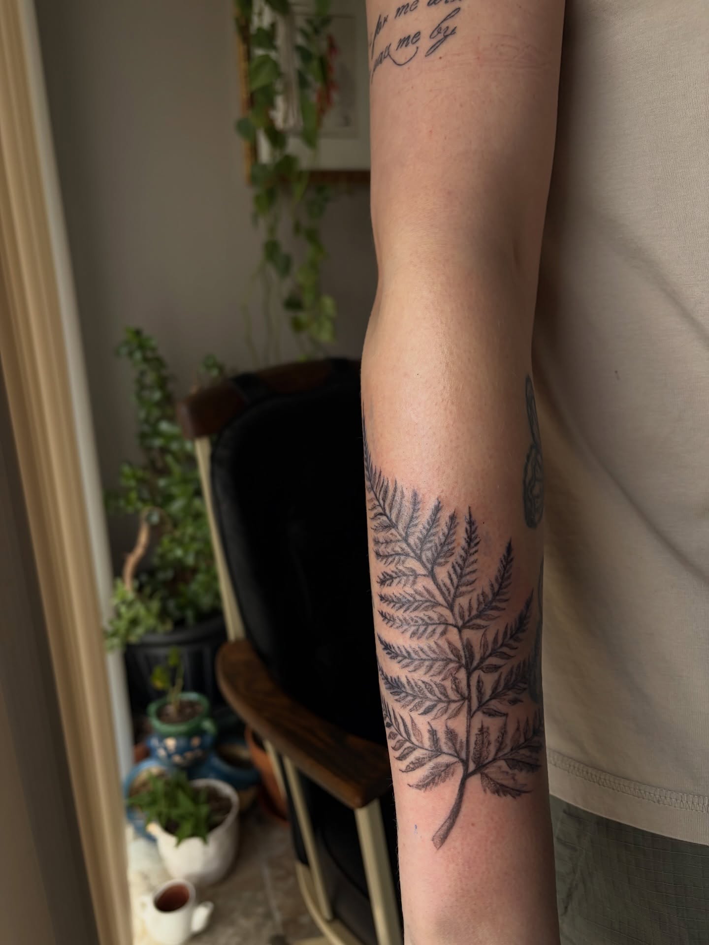 Fern black and grey tattoo on the forearm by ⚜️Embodied Tattoo⚜️, Columbus, Ohio