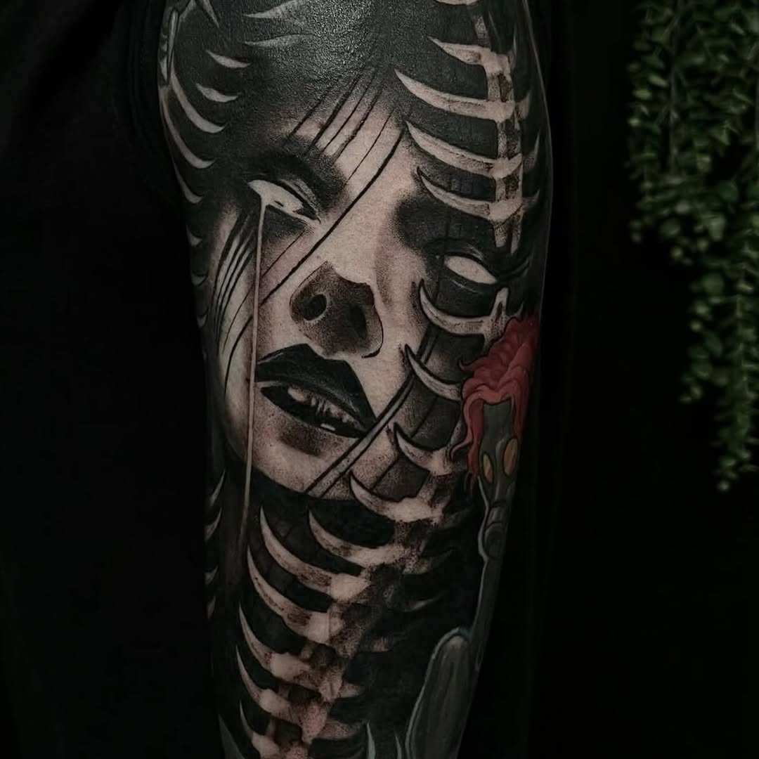 Gothic portrait with skeleton ribs realism tattoo on the forearm by Briana Walker