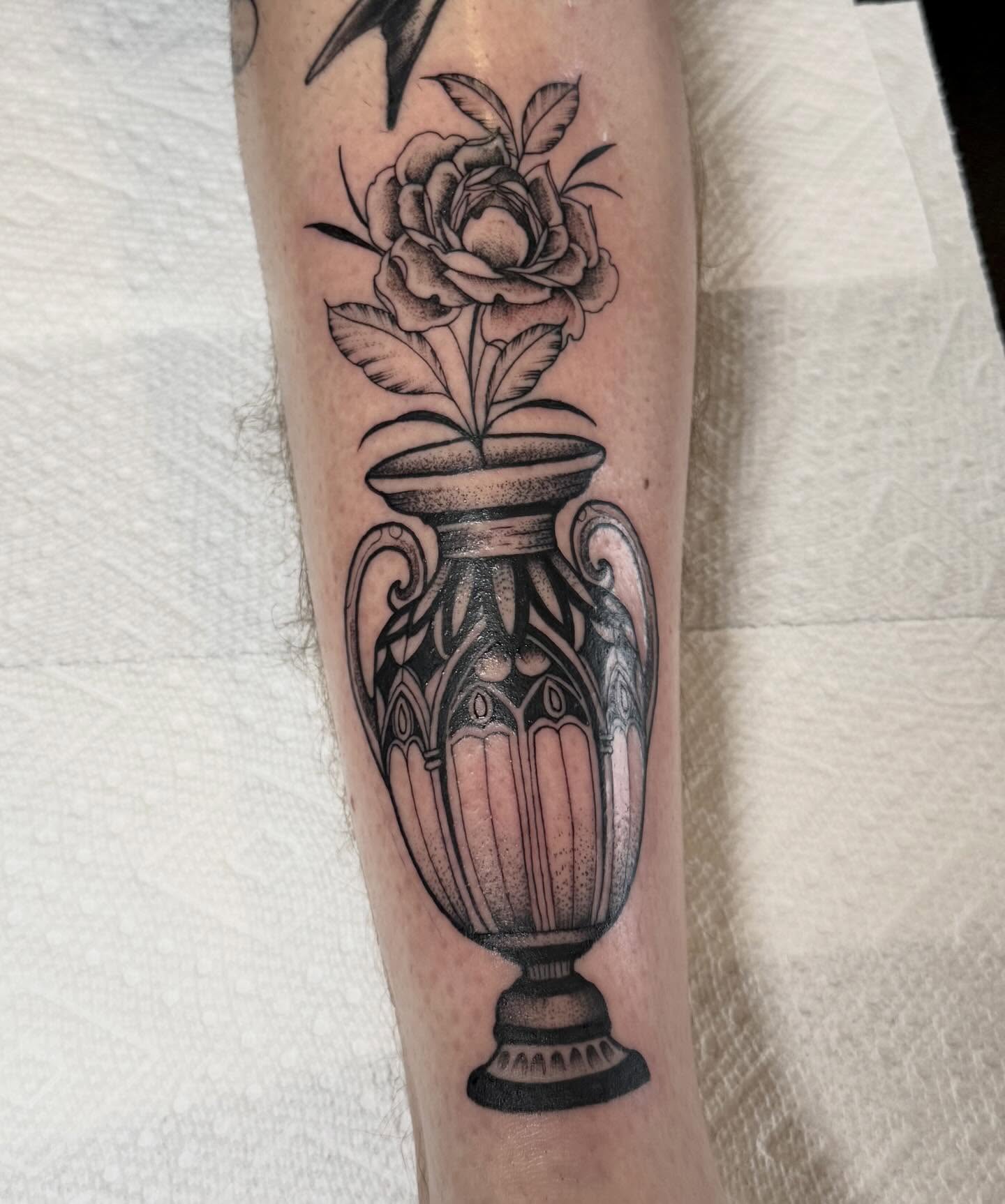 Vase with rose black and grey tattoo on the forearm by Sophia, New Carlisle, Ohio