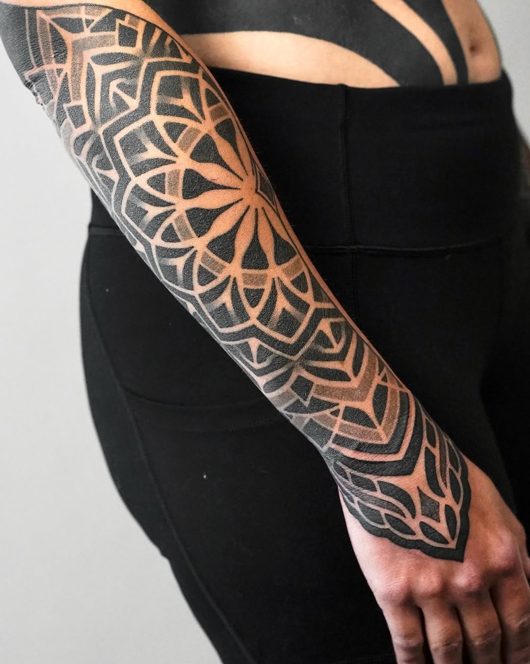 Tattoo by @rjxdots — geometric, blackwork