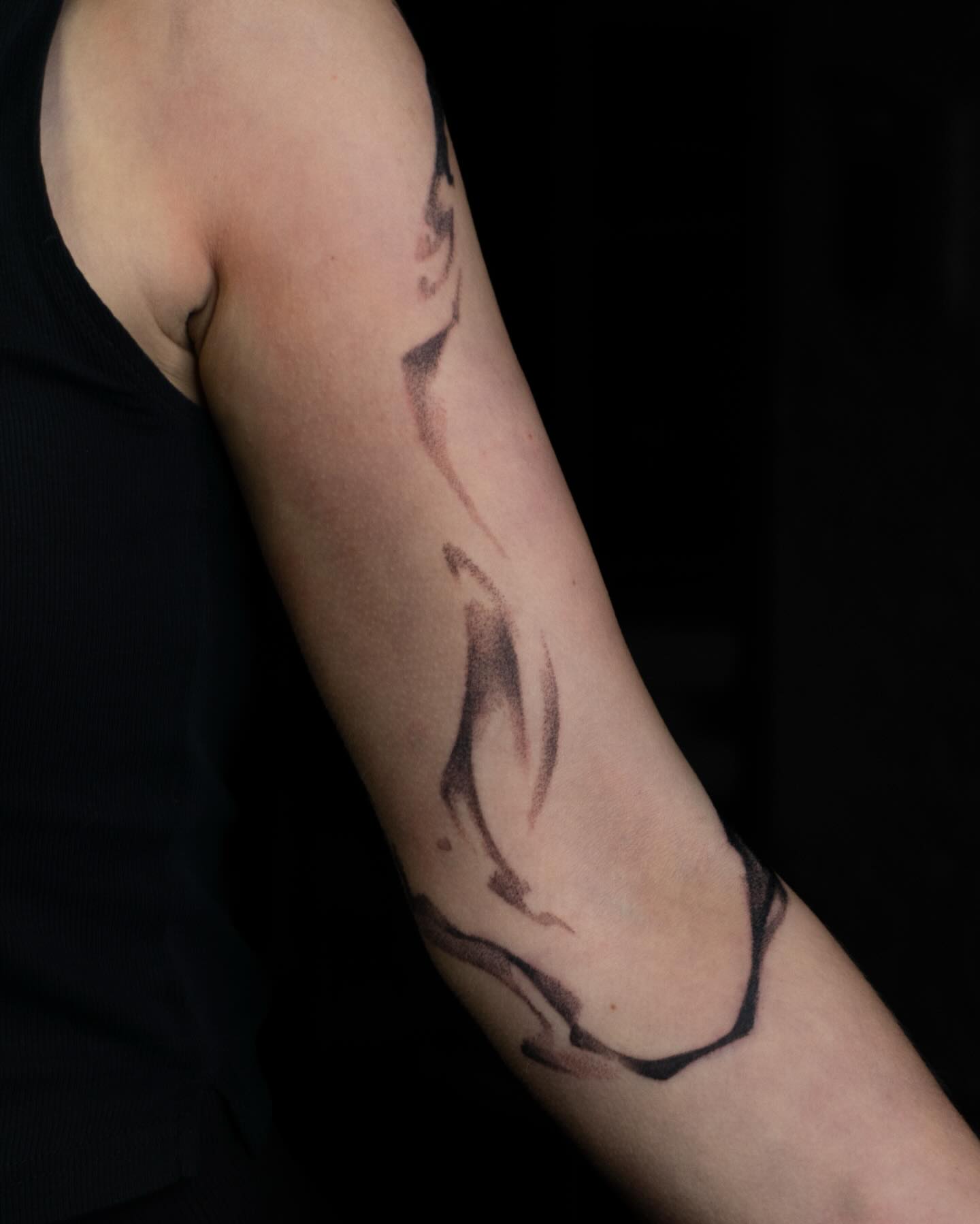 Abstract swirls dotwork tattoo on the forearm by Pietro Moleti