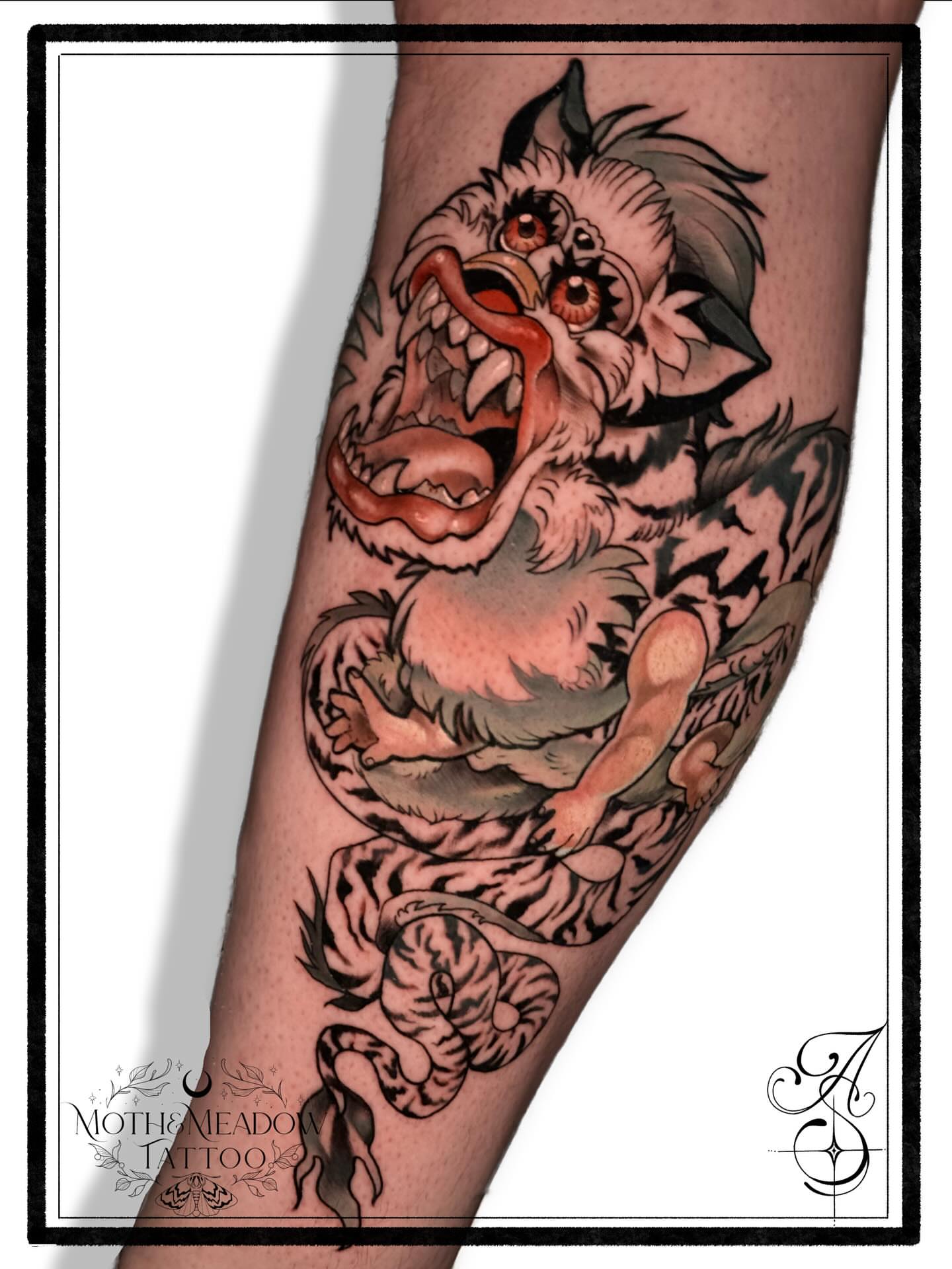 Monster American traditional tattoo on the forearm by Ash Sansoucie