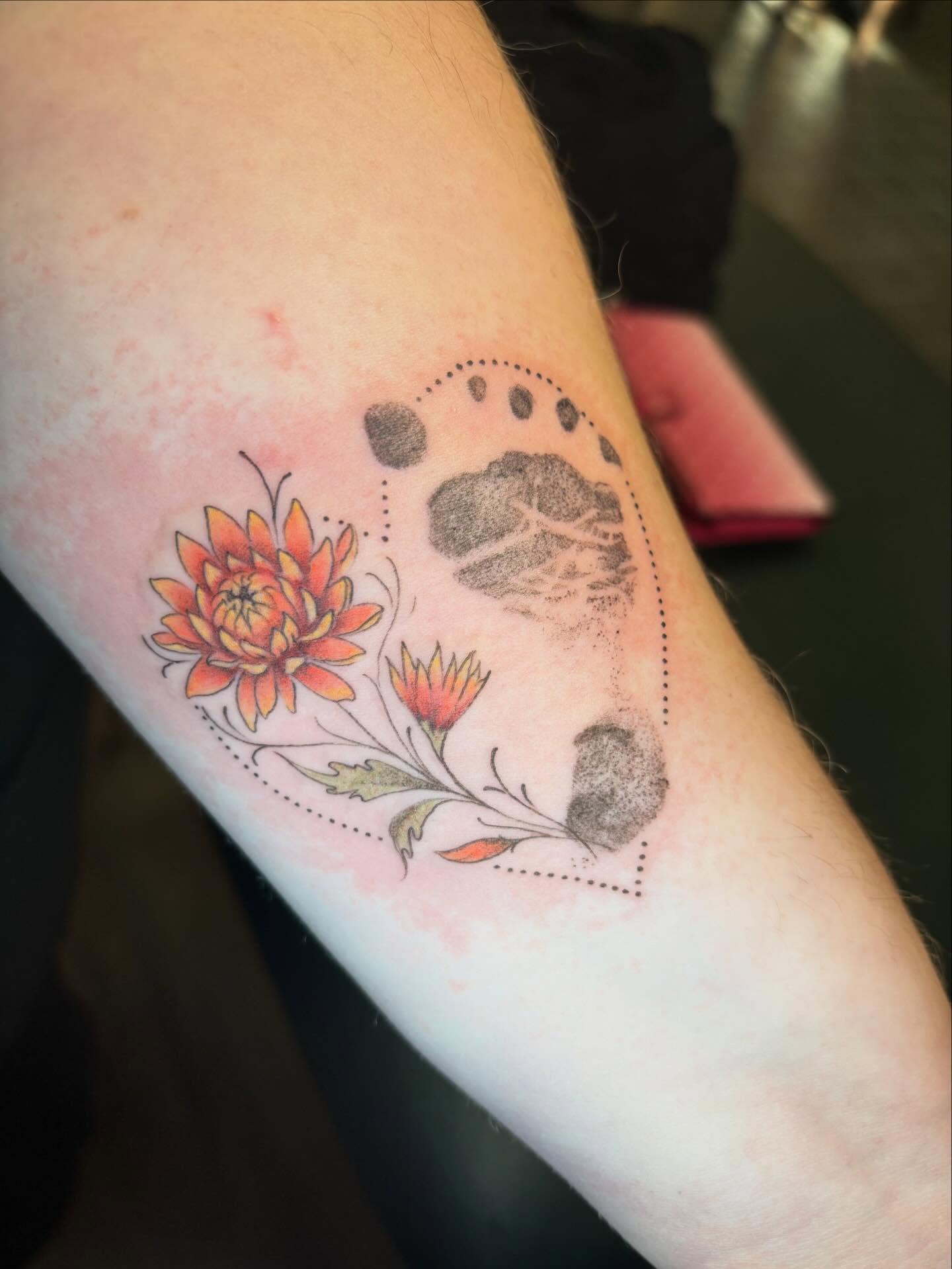 Tattoo by @tattoo.by.q — dotwork, watercolor