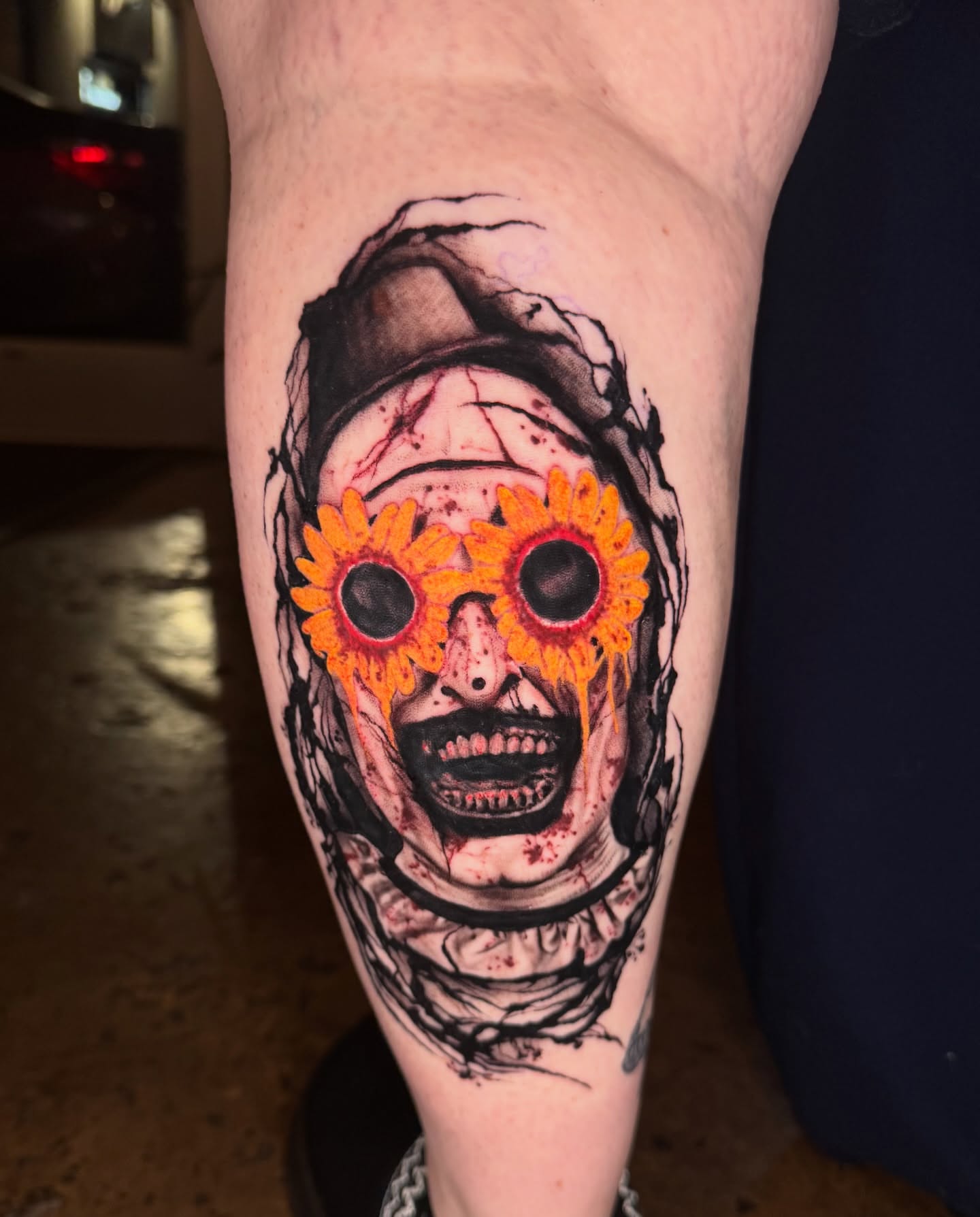 Sunflower dark realism tattoo on the forearm by Sideshow Danny