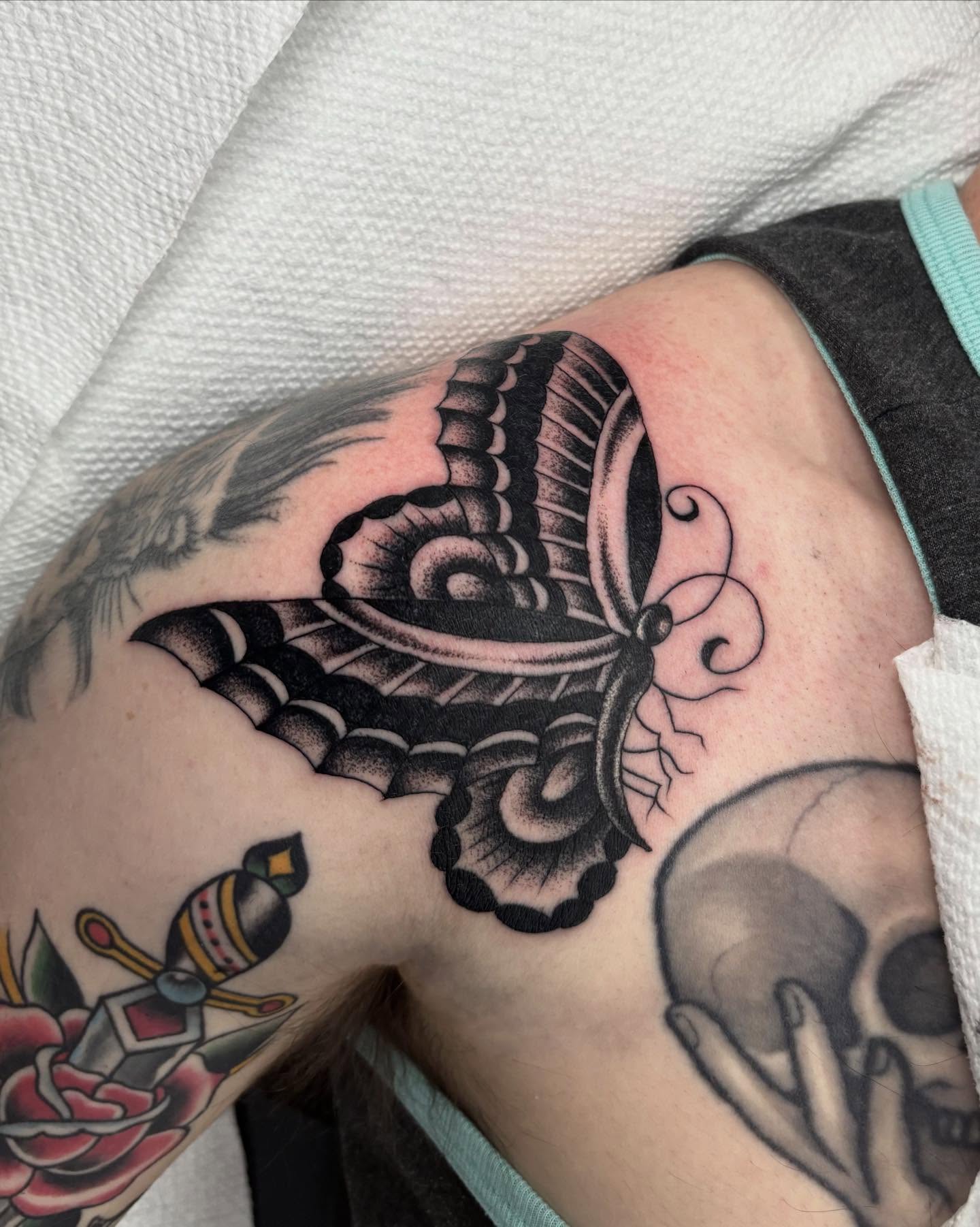 Butterfly American traditional tattoo on the thigh by ⟡ Sam O ⟡