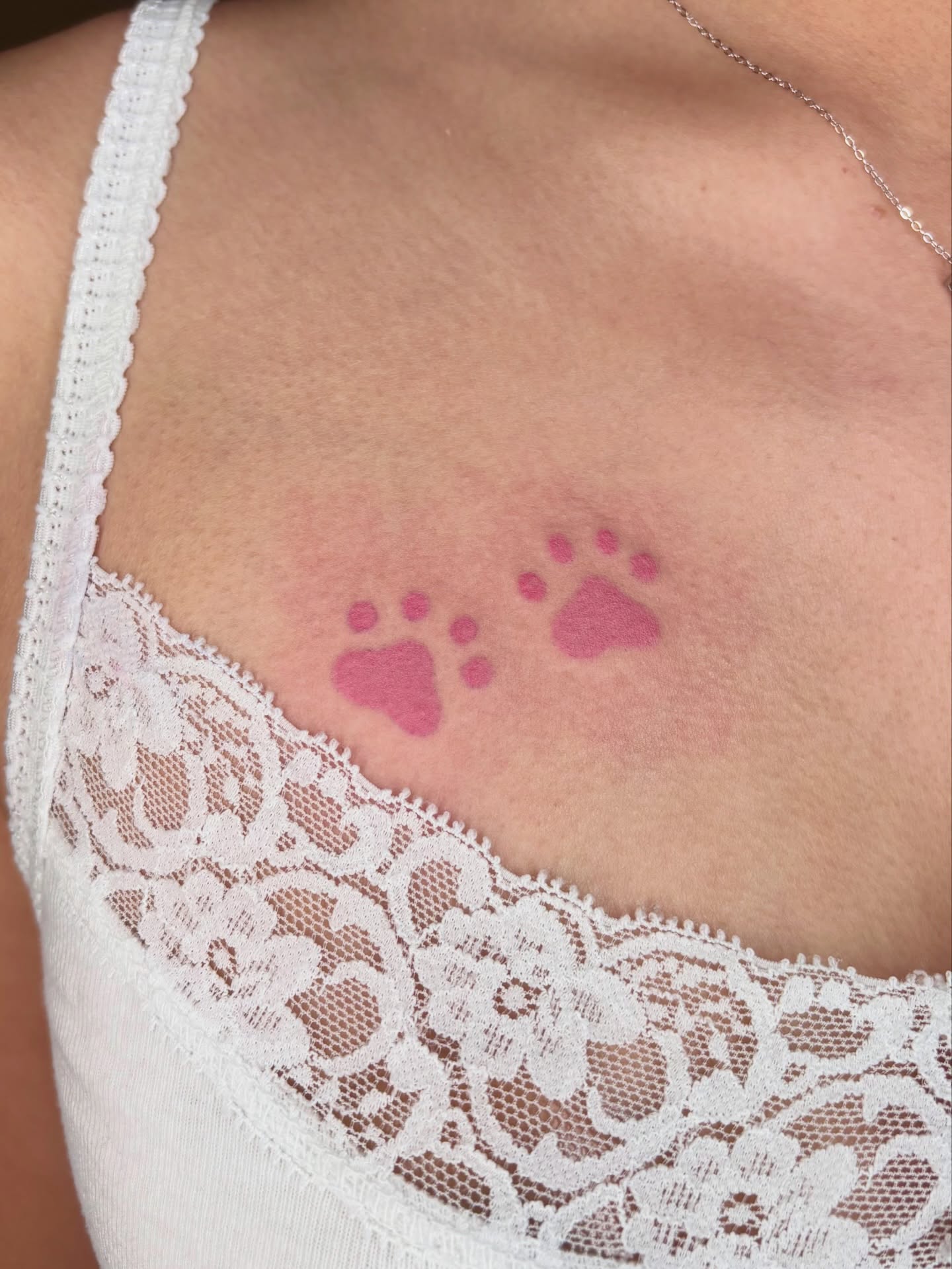 Paw prints dotwork tattoo on the chest by ๐ฎ๐ถ๐ ๐ โงโห โโ.