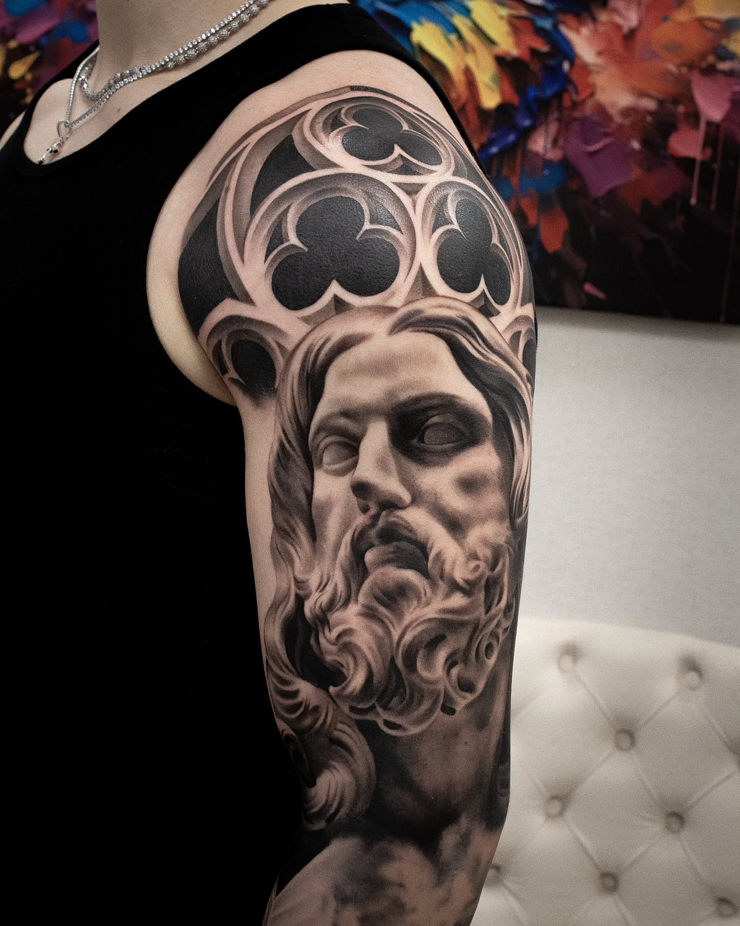 Religious figure realism tattoo on the forearm by Erik Bonilla