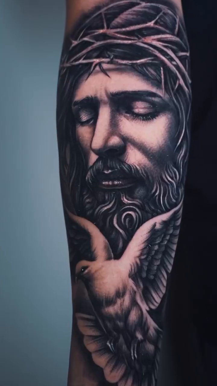 Jesus Christ and a dove realism tattoo by Danny Rodriguez