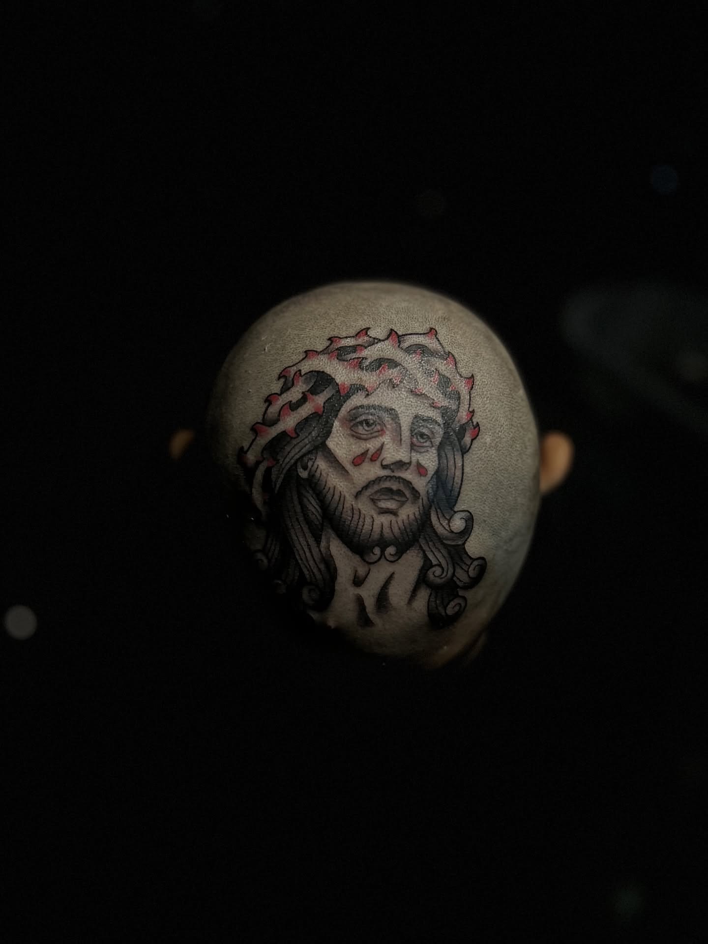 Religious figure black and grey tattoo on the head by Eli Flores